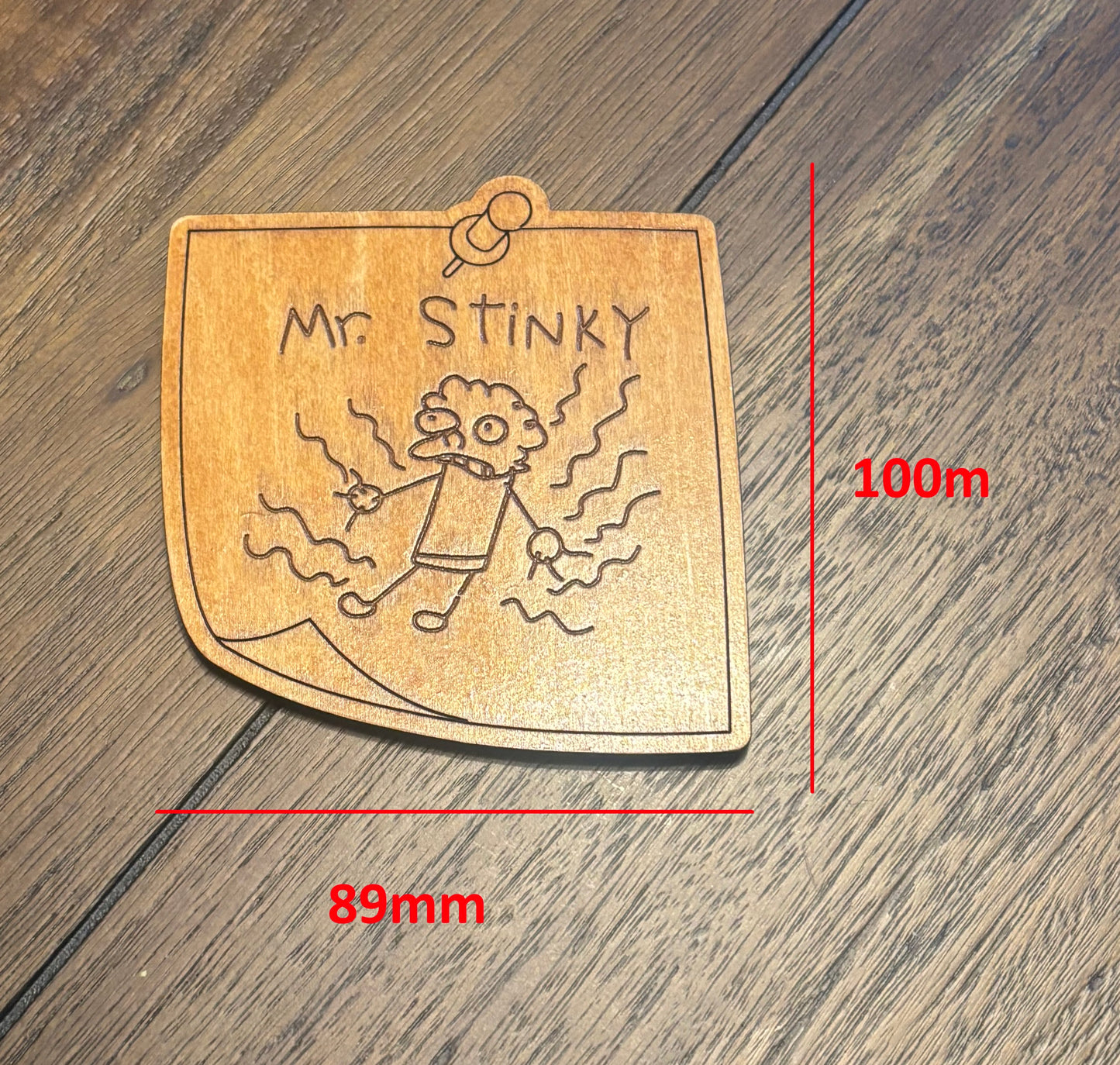 Stained basswood fridge magnet of the Mr Stinky drawing from the Simpsons