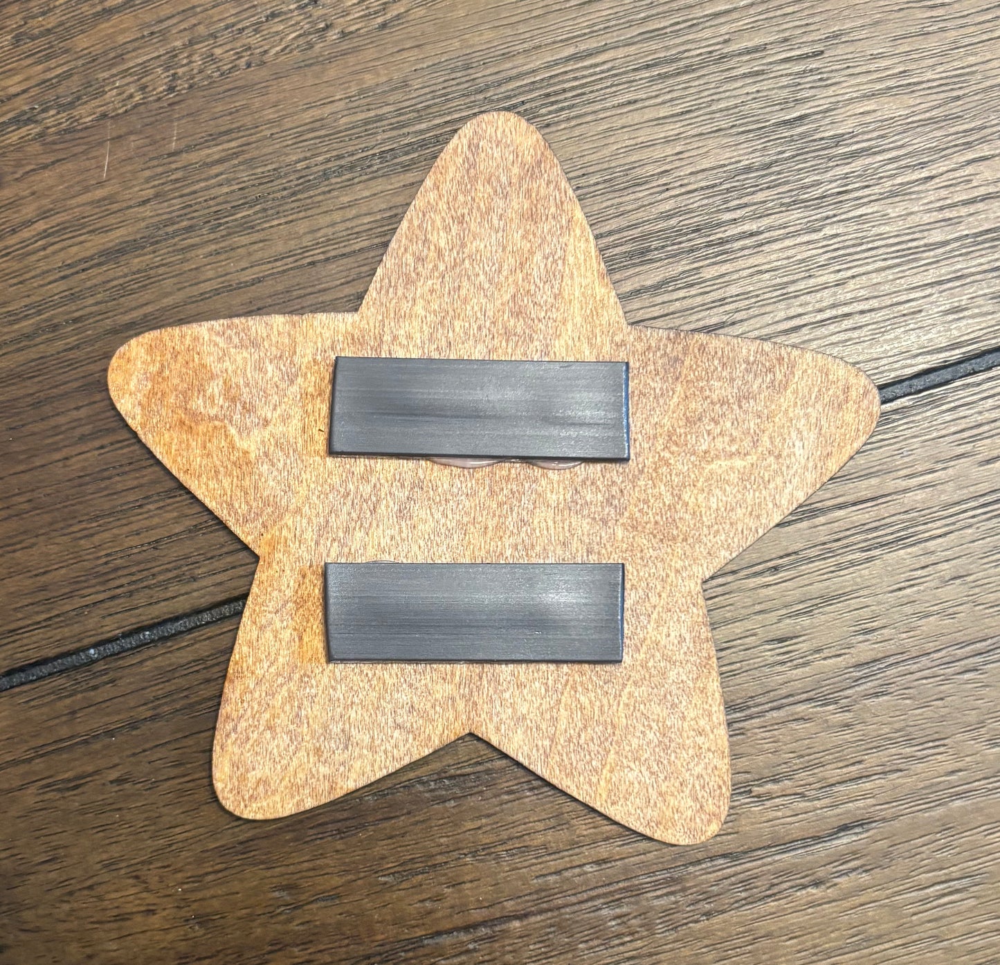 Stained basswood fridge magnet of a Super star from the Mario video games