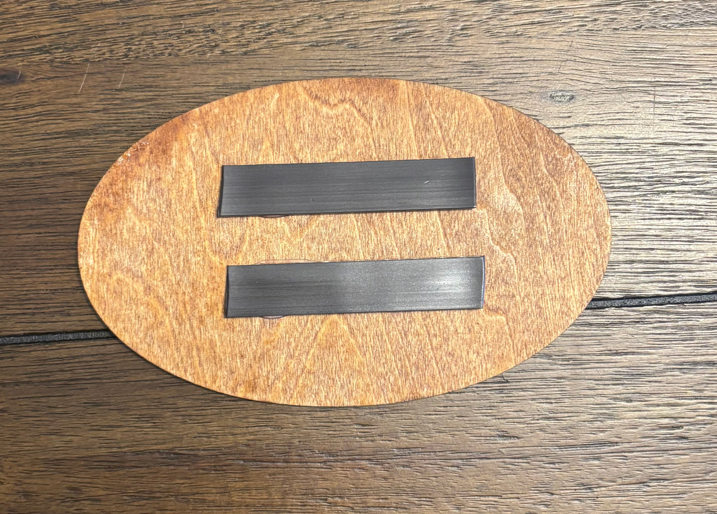 Stained basswood fridge magnet of the Batman logo
