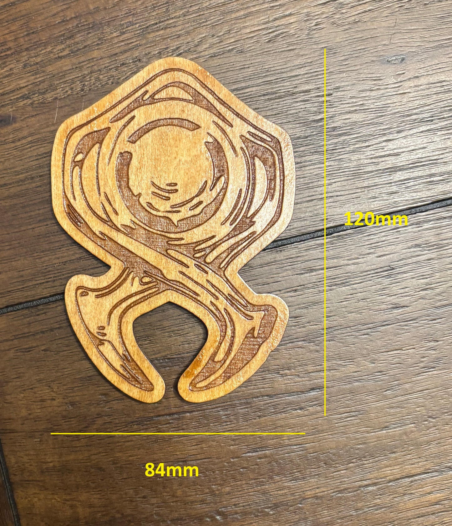 Stained basswood fridge magnet of the Horadrim symbol from the Diablo video games
