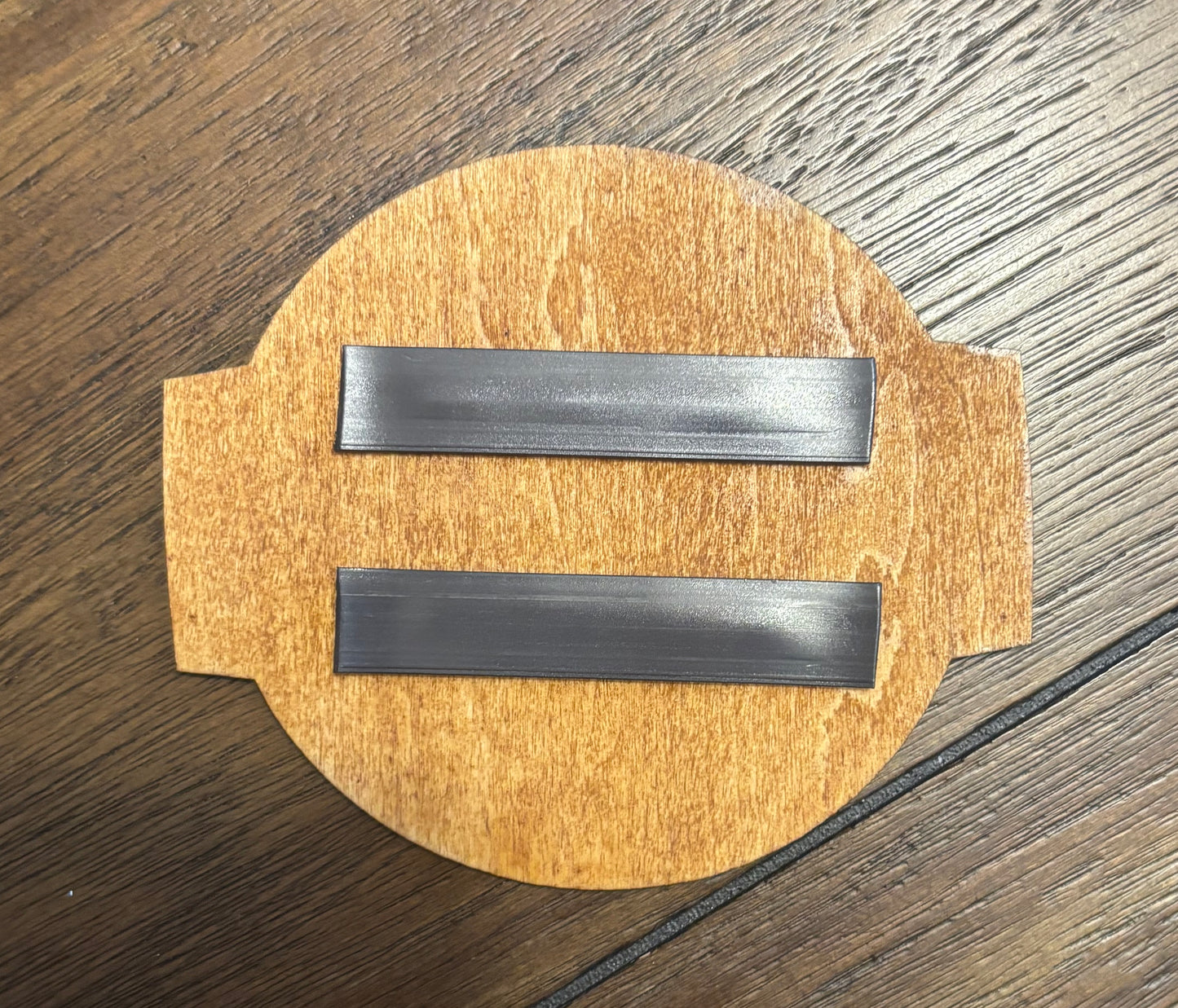 Stained basswood fridge magnet of Bioshock logo