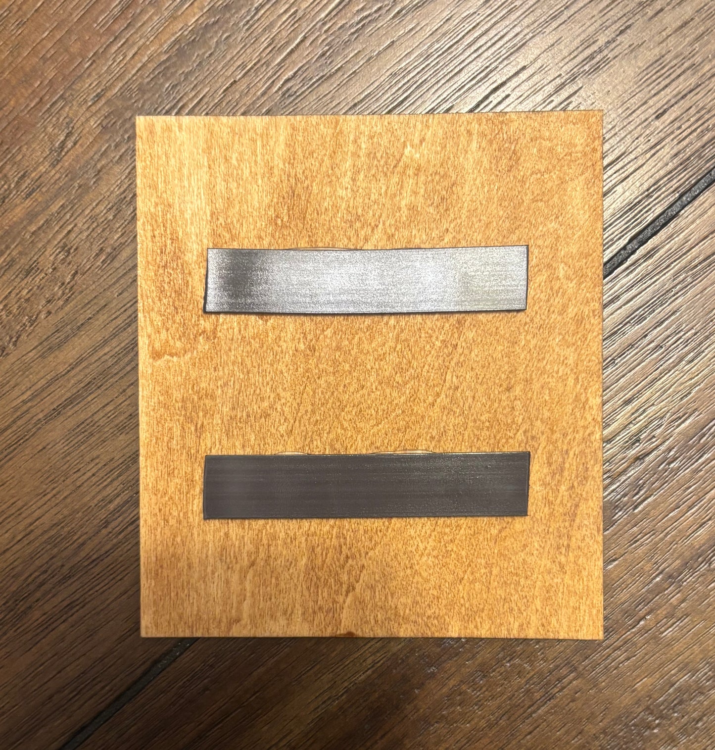Stained basswood fridge magnet of the Militech logo from the Cyberpunk 2077 video game