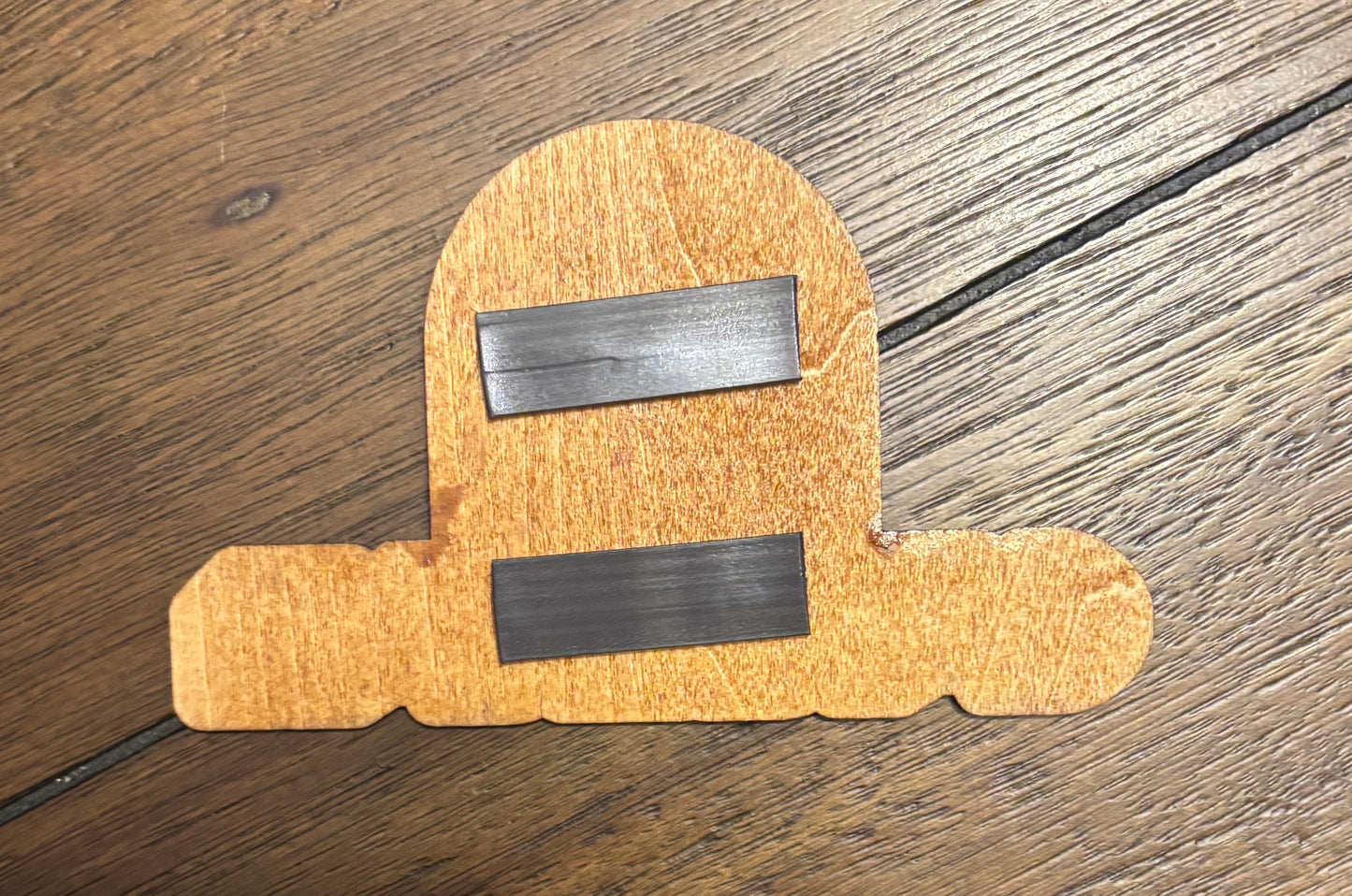 Stained basswood fridge magnet of the Arasaka logo from the Cyberpunk 2077 video game