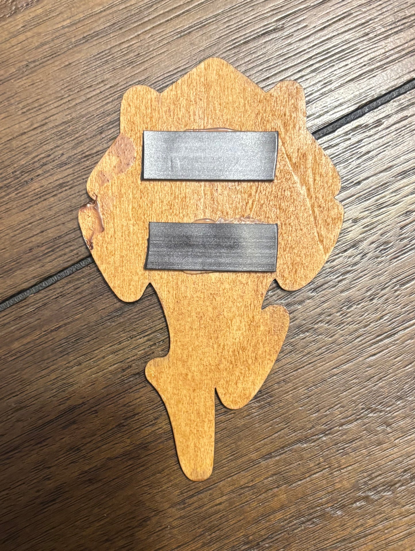 Stained basswood fridge magnet of a the Orcish Horde symbol from the Warcraft video games