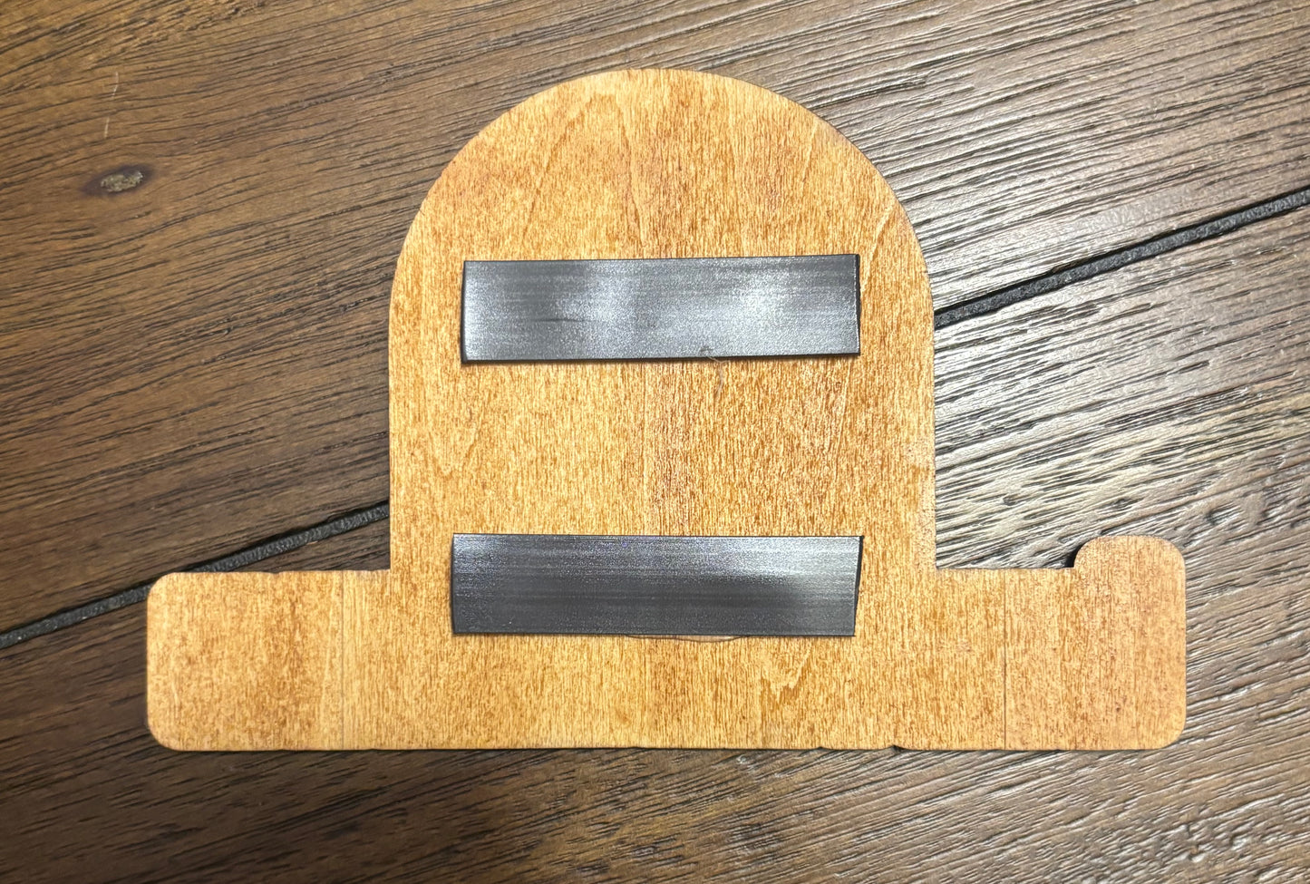 Stained basswood fridge magnet of the Biotechnica logo from the Cyberpunk 2077 video game