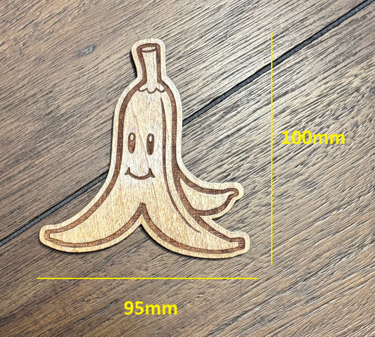 Stained basswood fridge magnet of a Banana peel the Mario video games