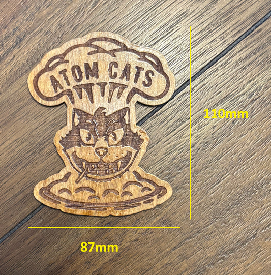 Stained basswood fridge magnet of the Atom Cats logo from the Fallout video games