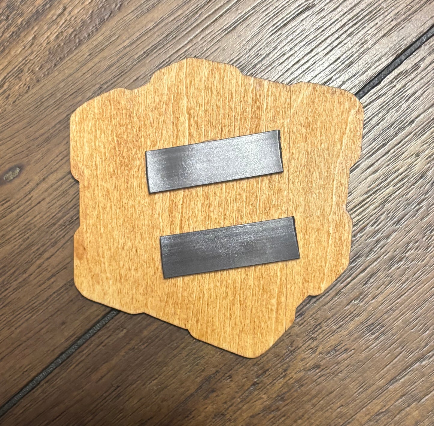 Stained basswood fridge magnet of the Companion Cube from the Portal video game