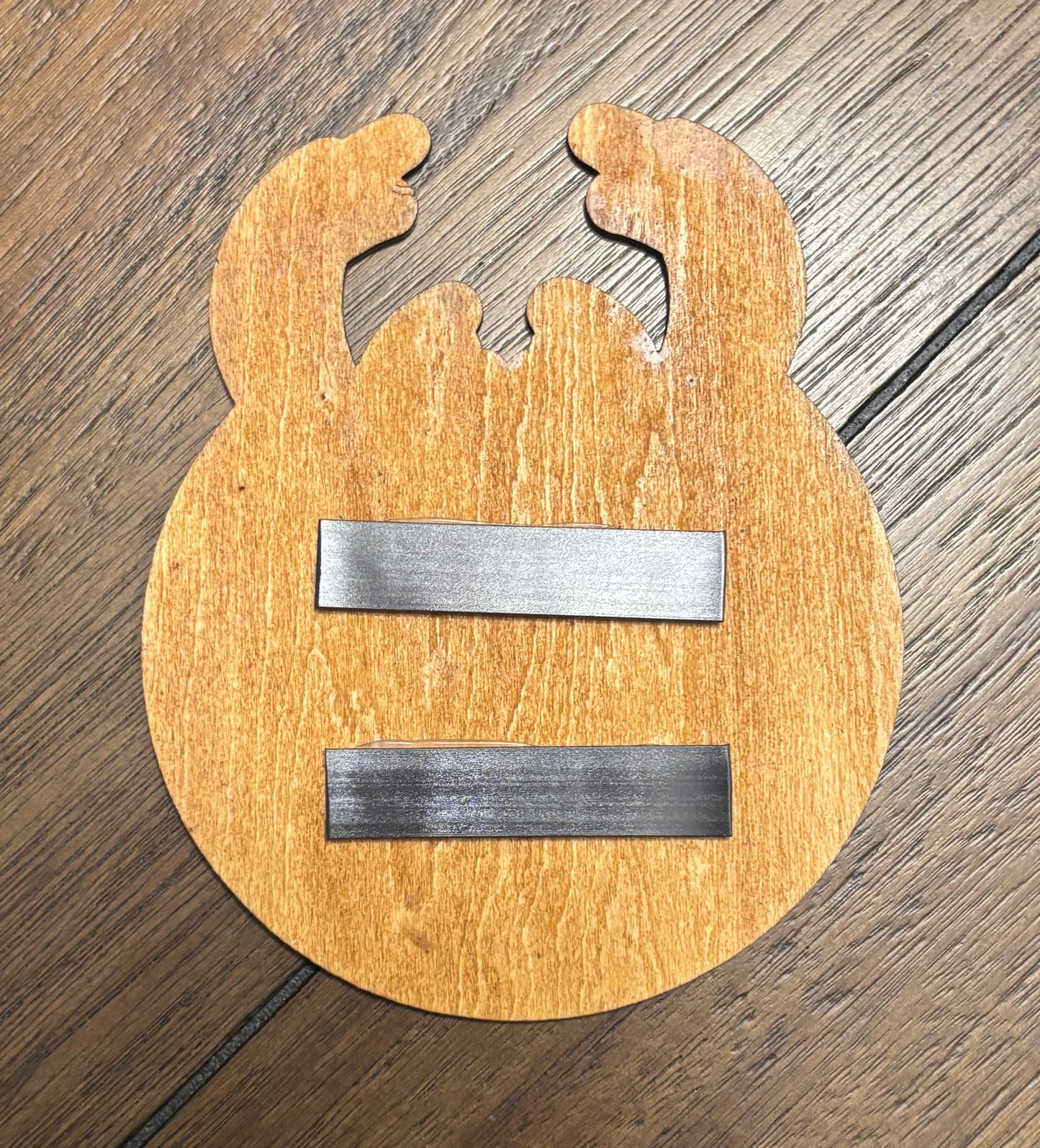 Stained basswood fridge magnet of the Milwaukee Bucks basketball team logo
