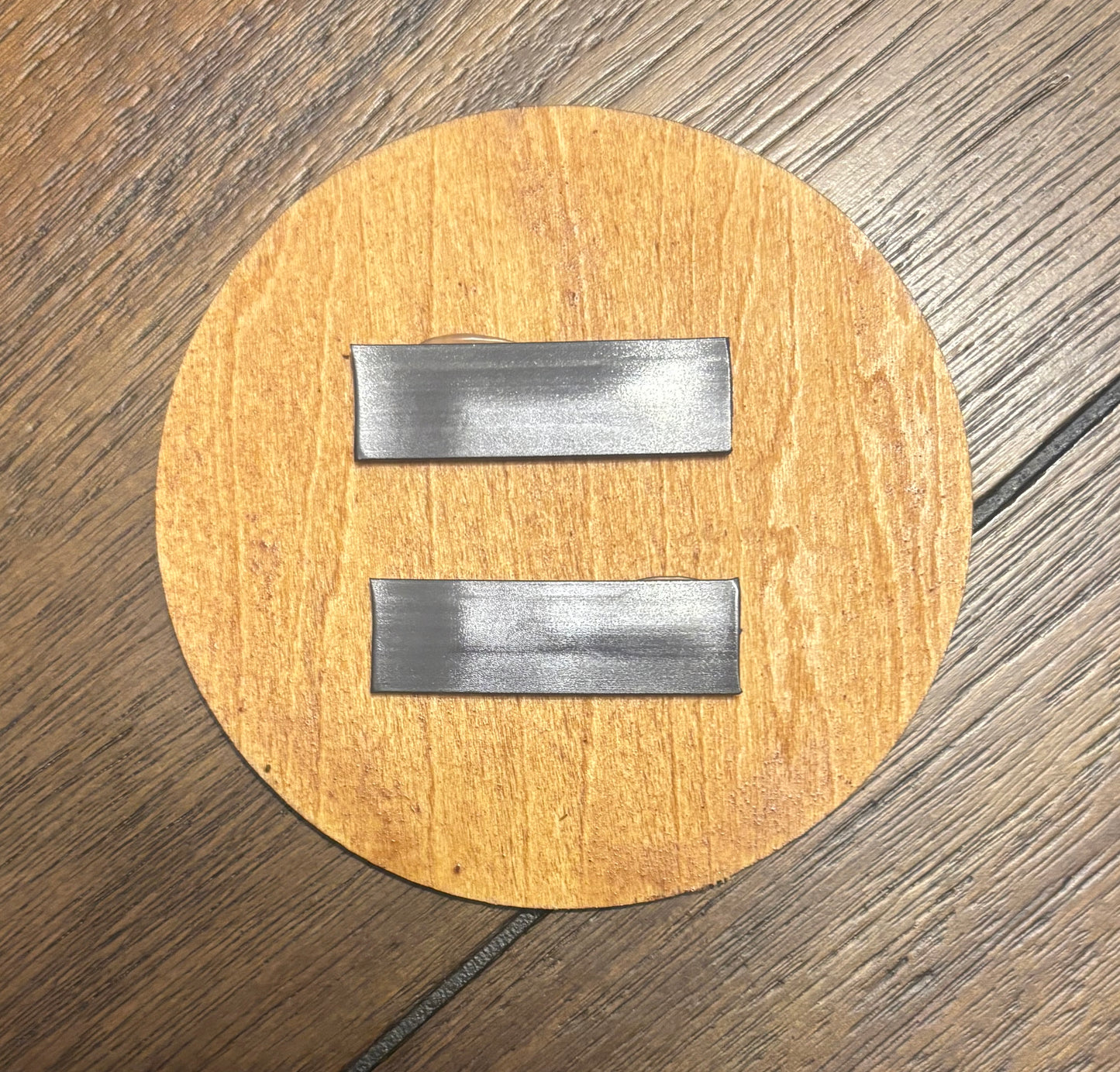 Stained basswood fridge magnet of the Assassin's Creed logo