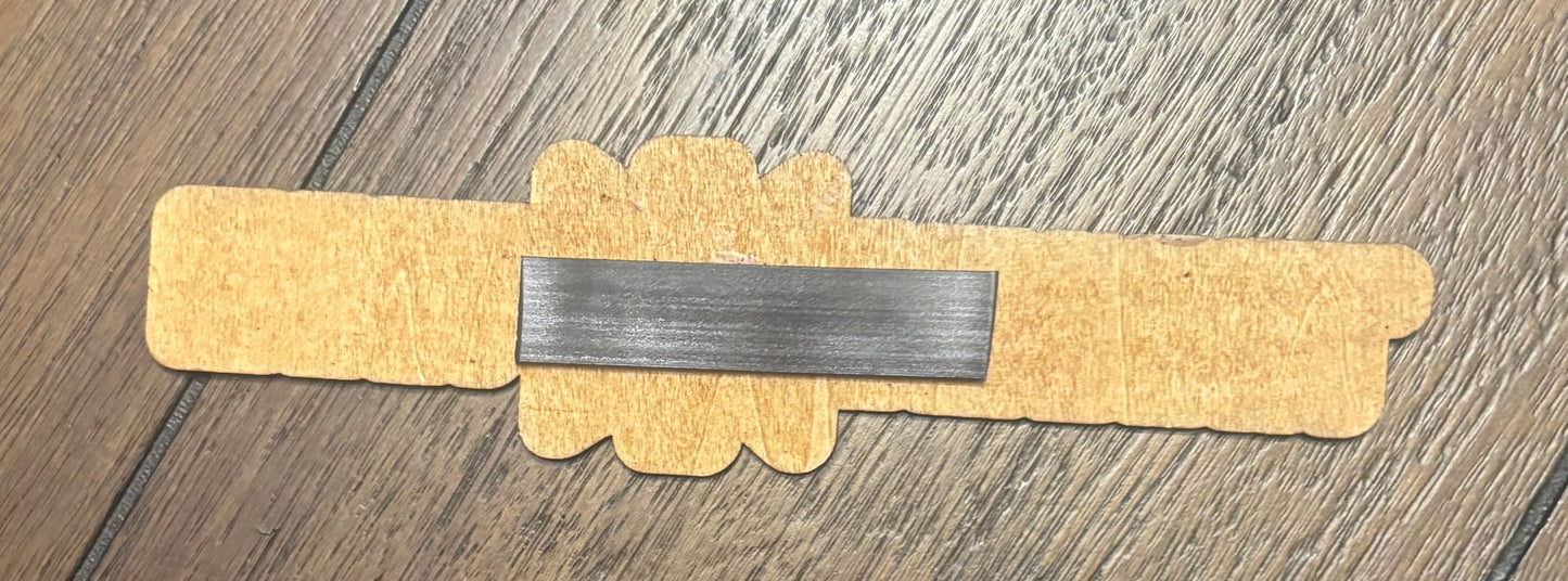 Stained basswood fridge magnet of the Trauma Team logo from the Cyberpunk 2077 video game
