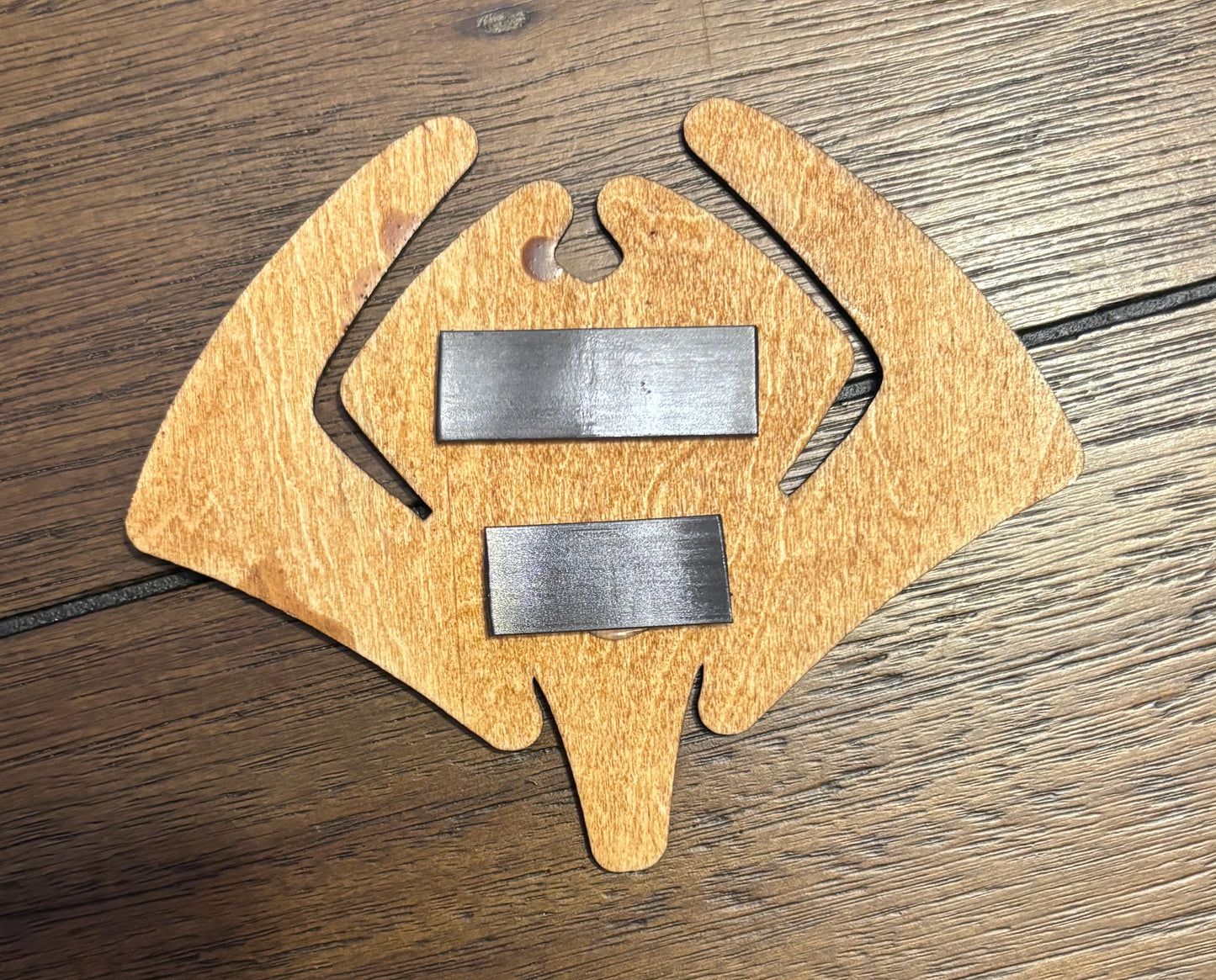 Stained basswood fridge magnet of the Mental logo from the video game Series Sam