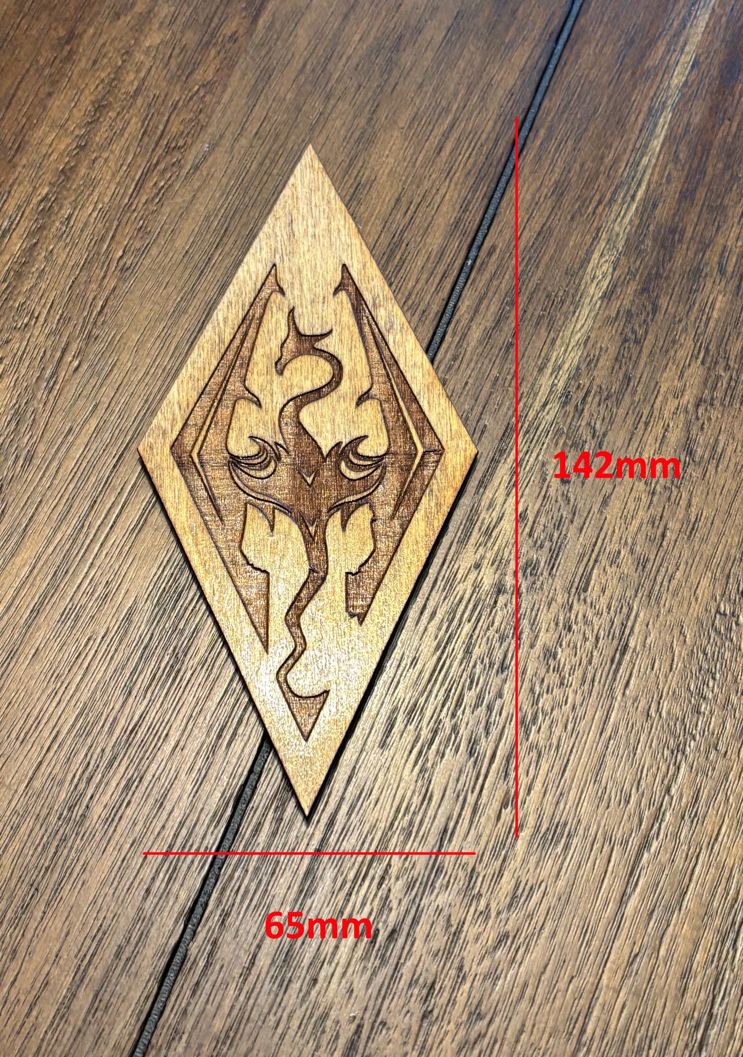 Stained basswood fridge magnet of the Skyrim icon from the Skyrim video game