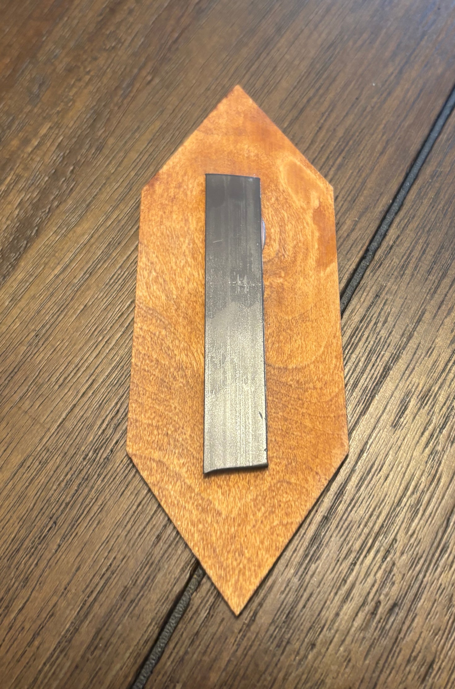 Stained basswood fridge magnet of the Church of Robotology logo from Futurama