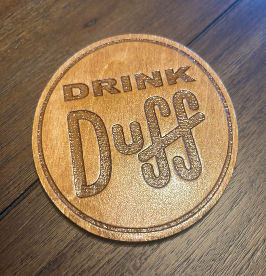 Stained basswood fridge magnet of the Drink Duff sticker from the Simpsons
