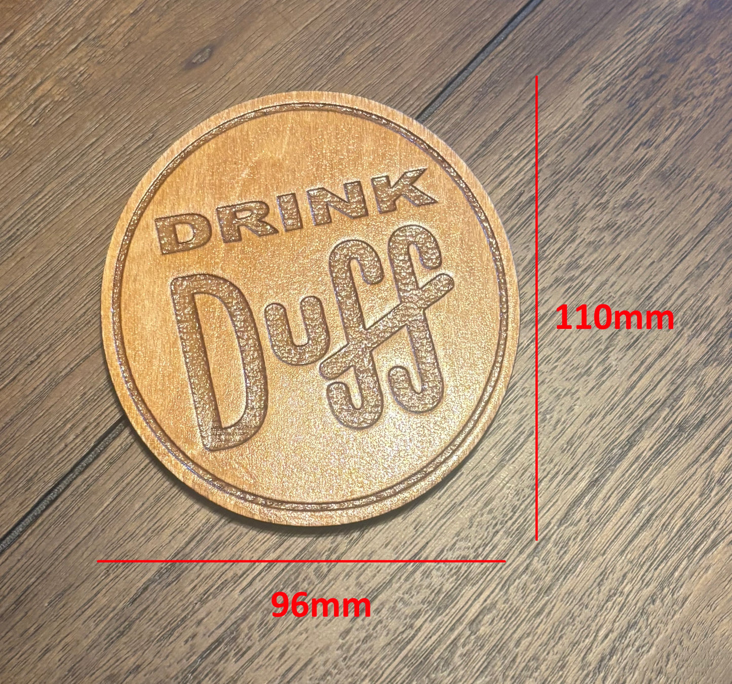 Stained basswood fridge magnet of the Drink Duff sticker from the Simpsons