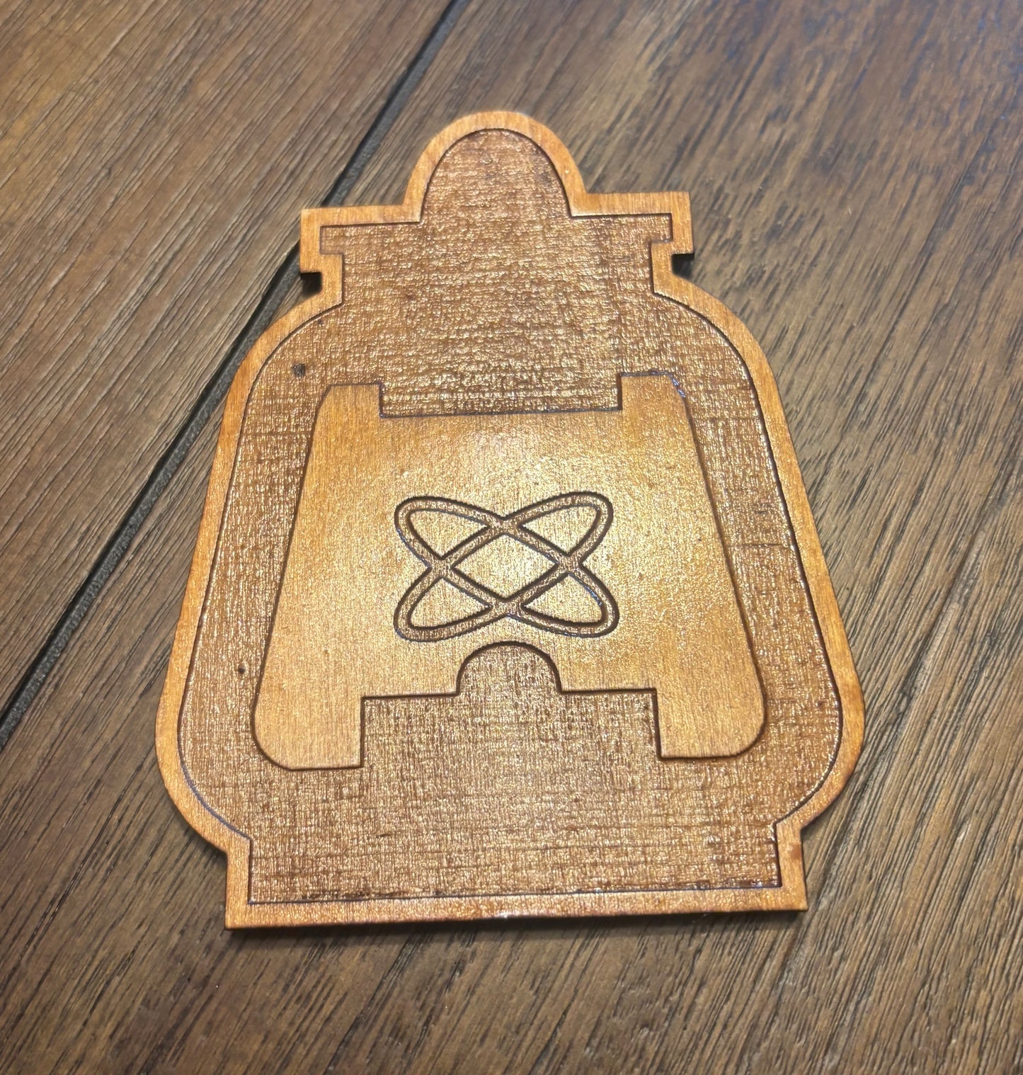 Stained basswood fridge magnet of the Railroad logo from the Fallout video games
