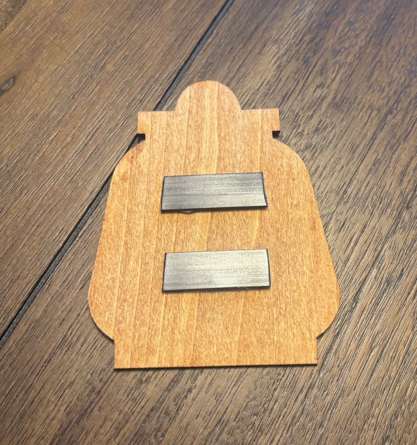 Stained basswood fridge magnet of the Railroad logo from the Fallout video games