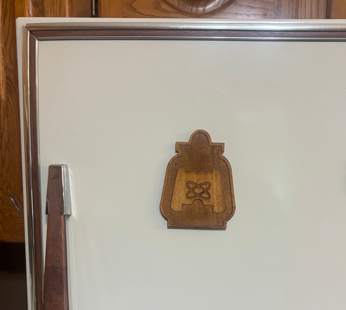 Stained basswood fridge magnet of the Railroad logo from the Fallout video games
