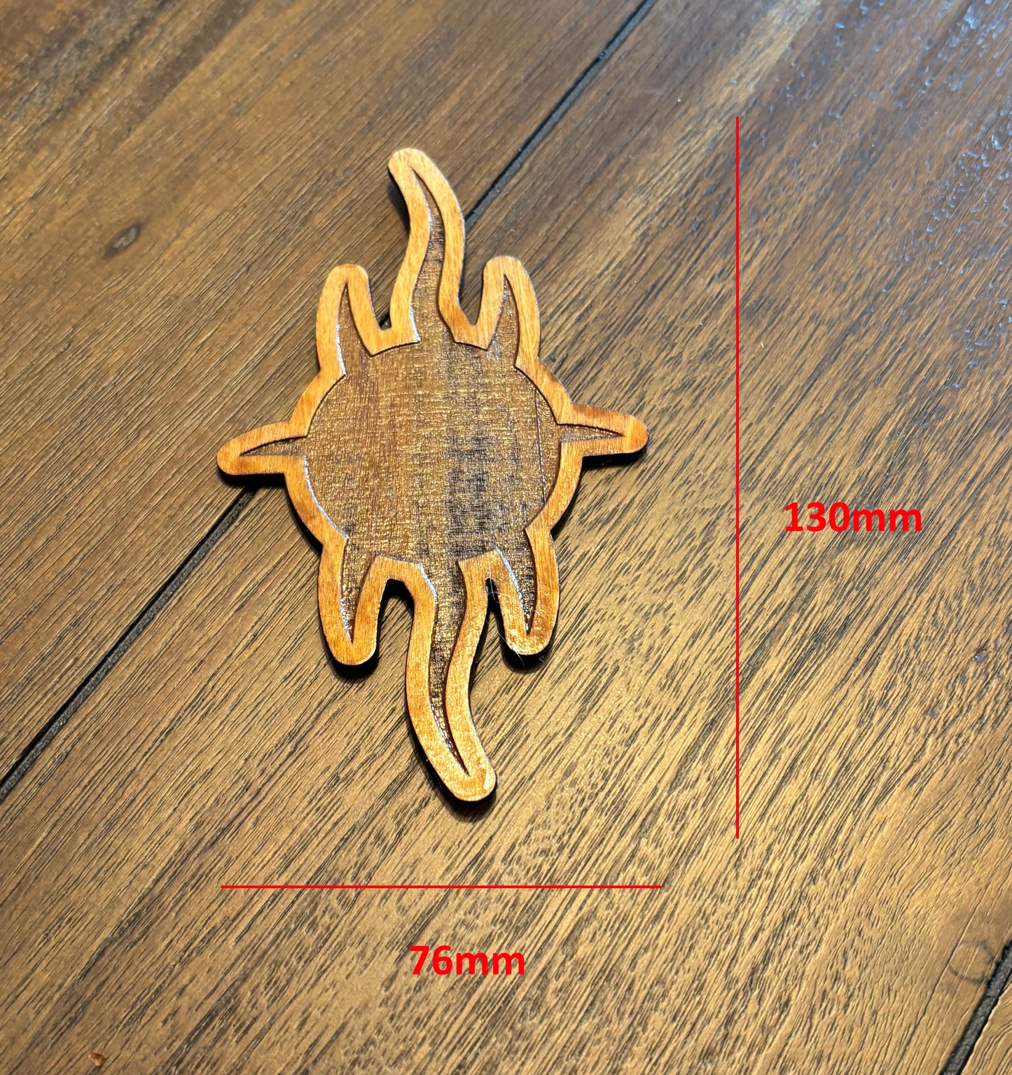 Stained basswood fridge magnet of the Church of Yivo logo from Futurama