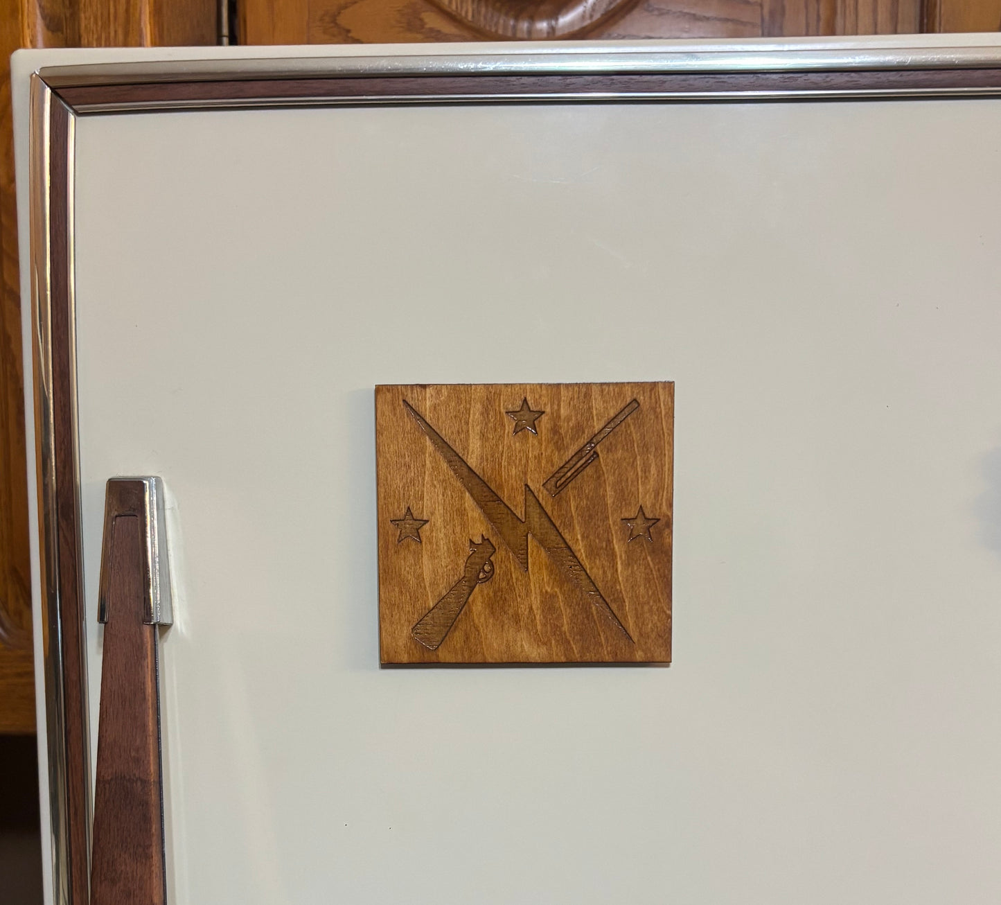 Stained basswood fridge magnet of the Minutemen logo from the Fallout video games