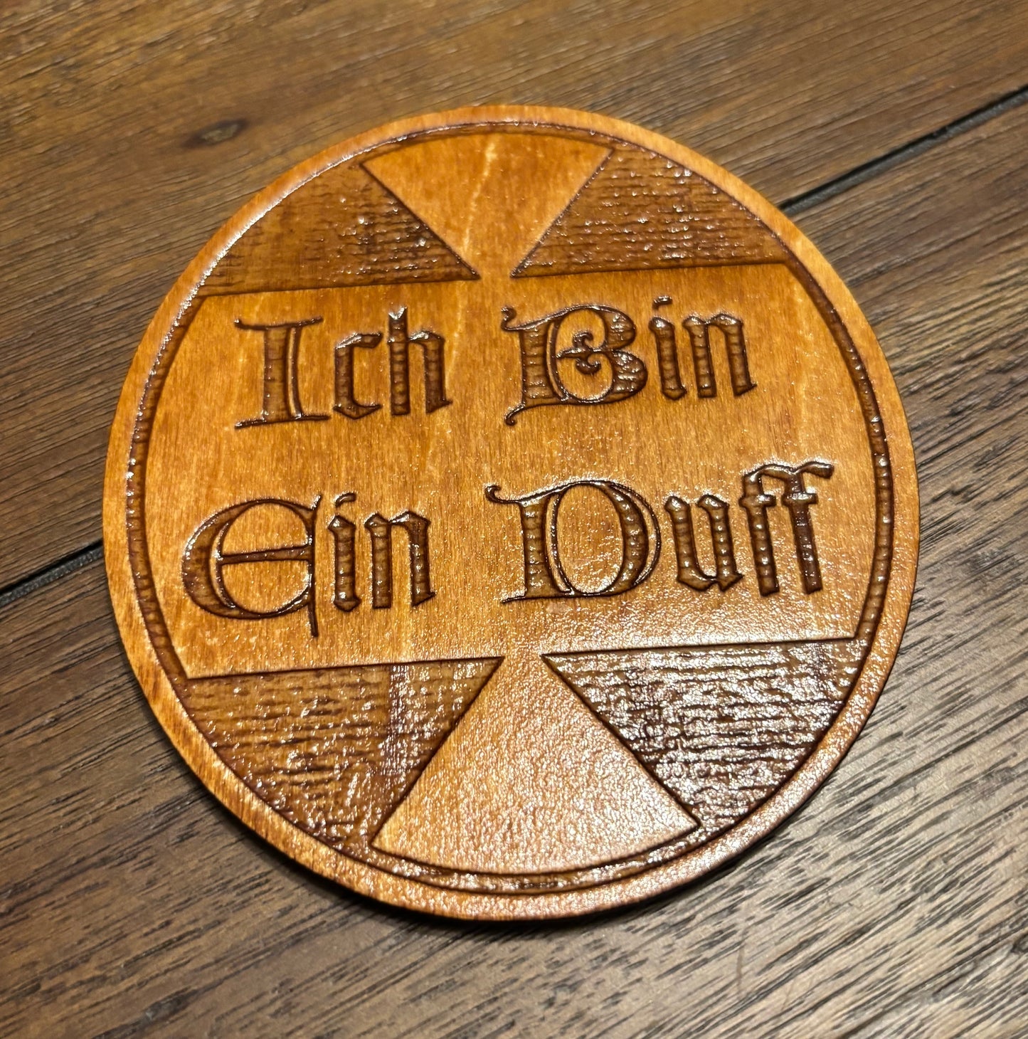 Stained basswood fridge magnet of the Ich bin ein Duff sticker from the Simpsons