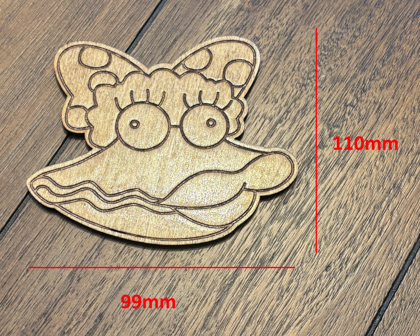 Stained basswood fridge magnet of Oyster Lucy from the Simpsons