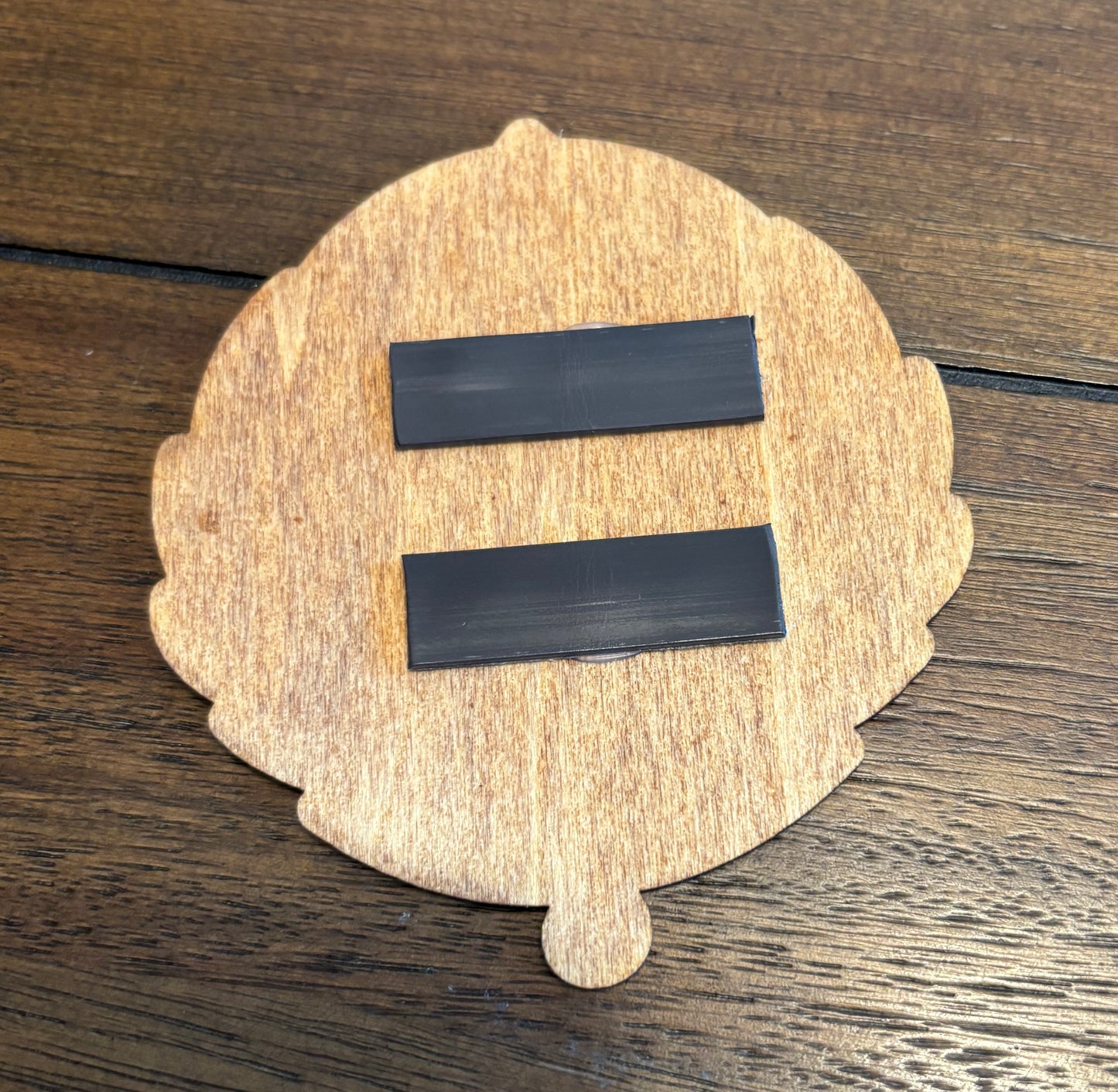Stained basswood fridge magnet of the Brotherhood of Steel logo from the Fallout video games