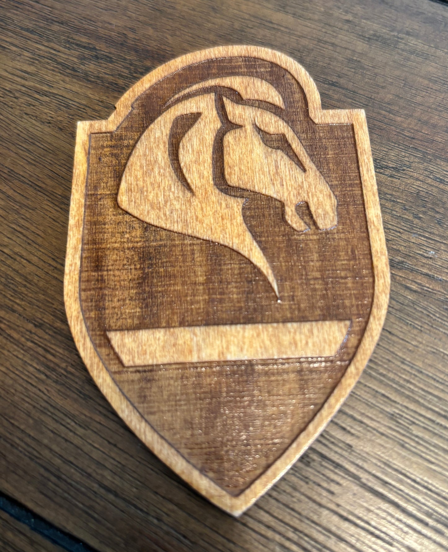 Stained basswood fridge magnet of the Whiterun icon from the Skyrim video game