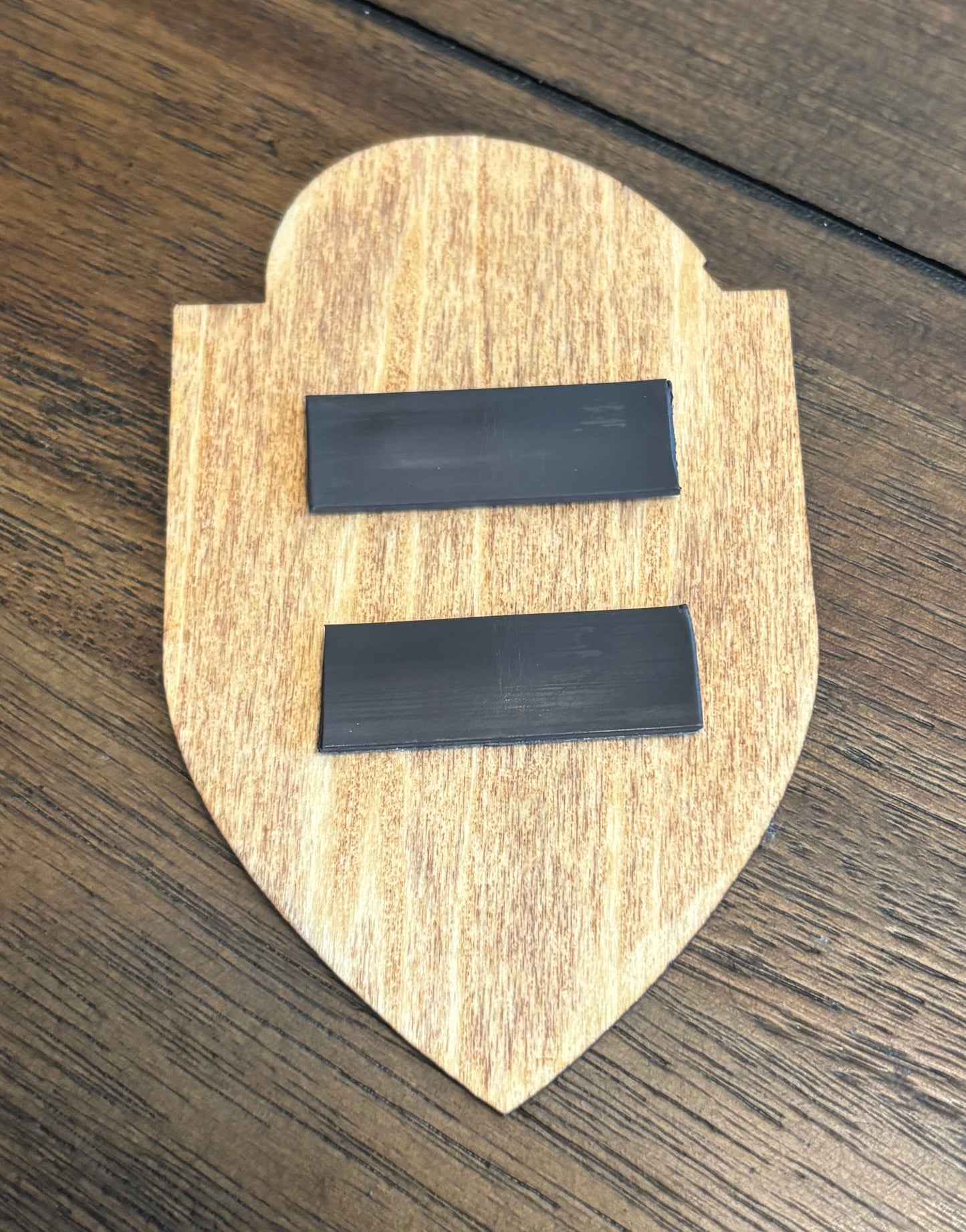 Stained basswood fridge magnet of the Whiterun icon from the Skyrim video game