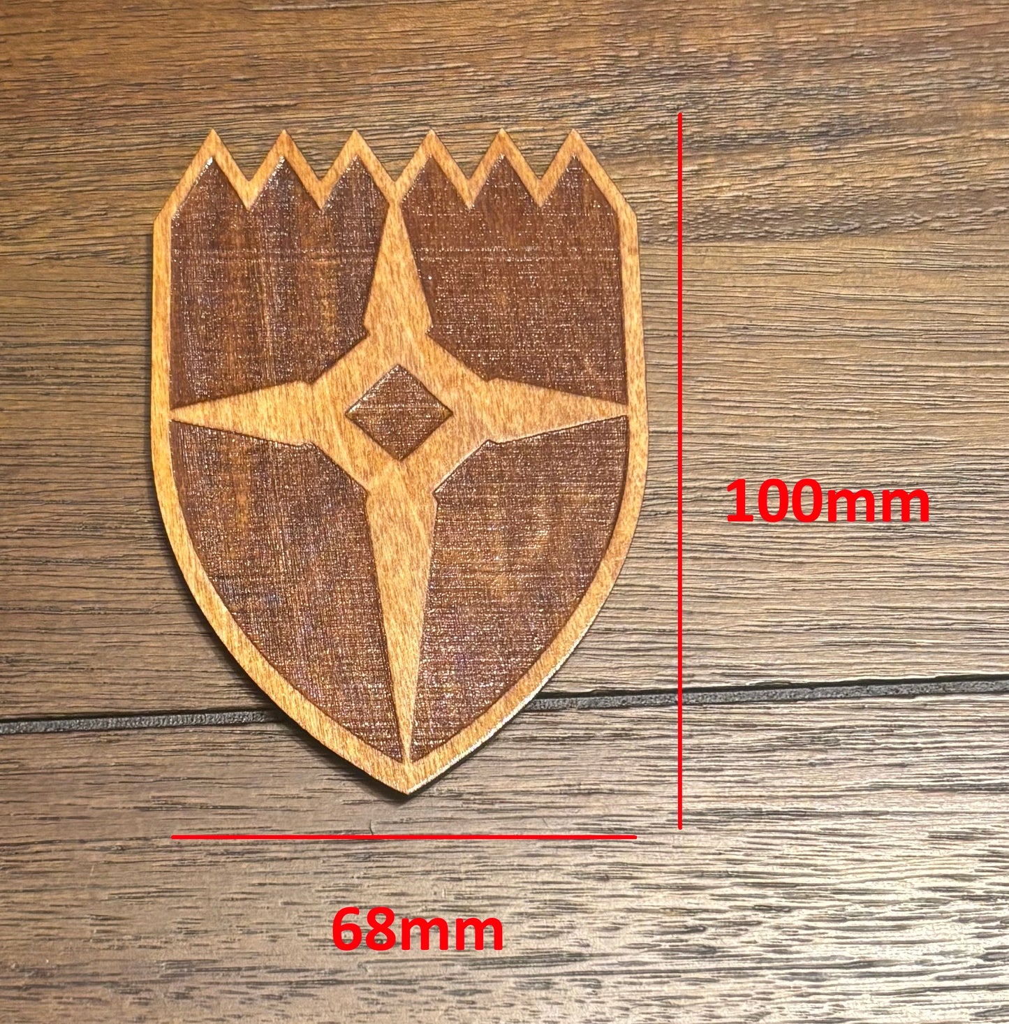 Stained basswood fridge magnet of the Dawnstar icon from the Skyrim video game