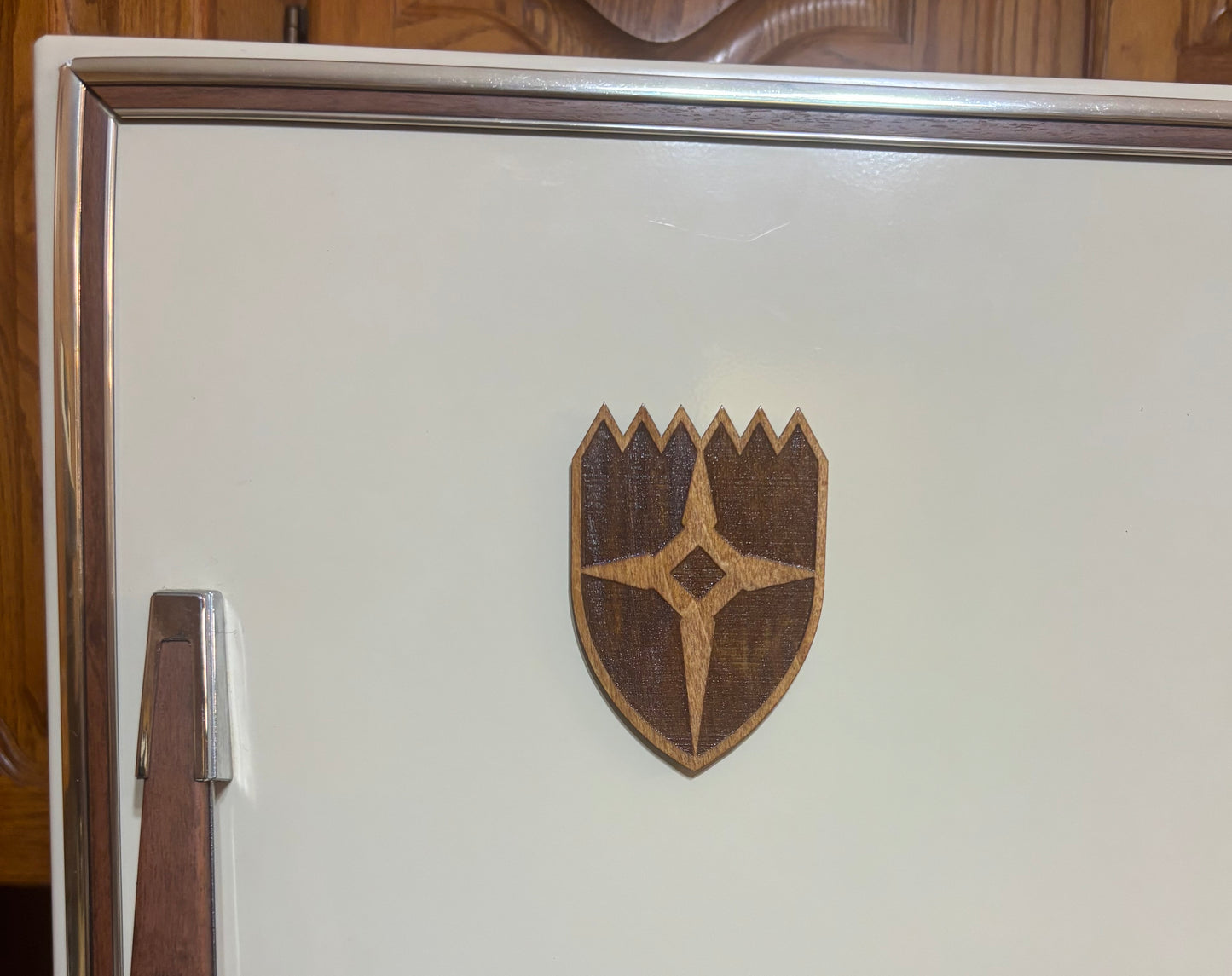 Stained basswood fridge magnet of the Dawnstar icon from the Skyrim video game