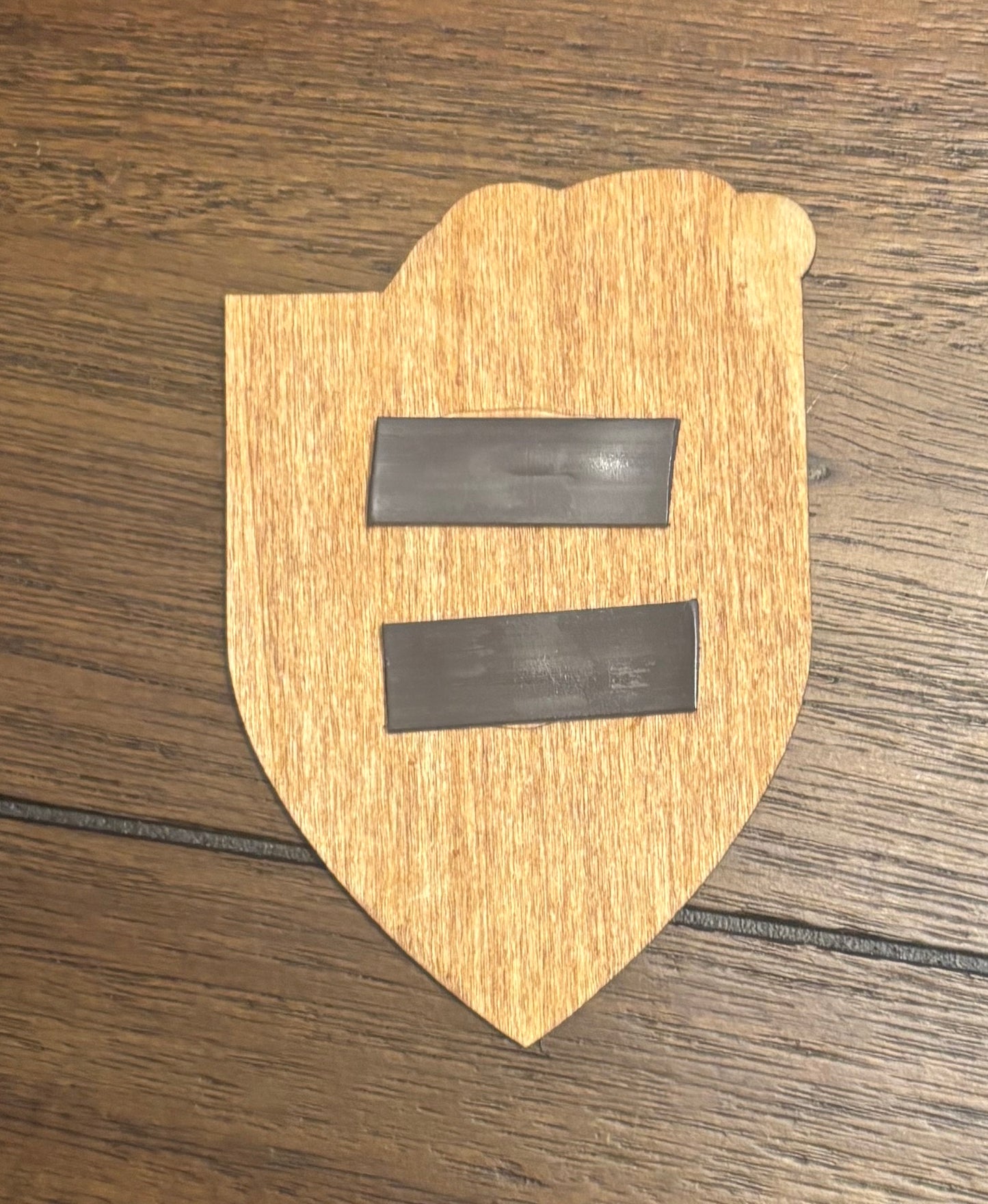 Stained basswood fridge magnet of the Windhelm icon from the Skyrim video game