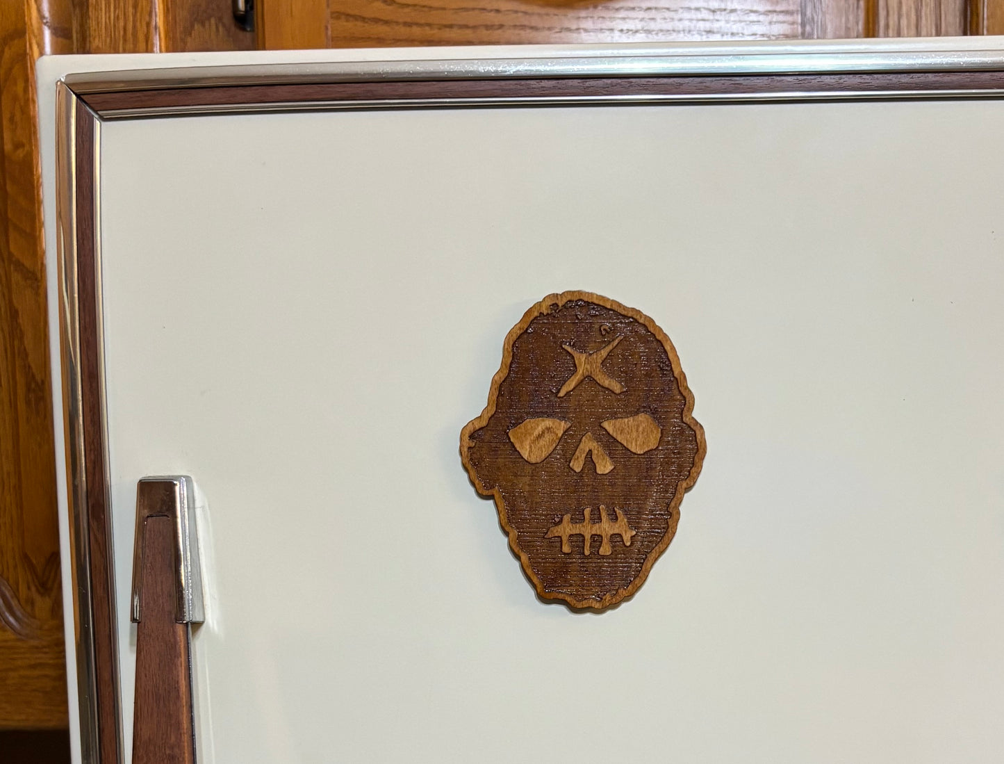 Stained basswood fridge magnet of the Gunners logo from the Fallout video games