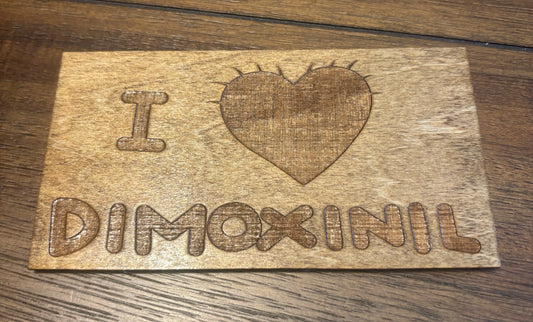 Stained basswood fridge magnet of the I love Demoxinil shirt from the Simpsons
