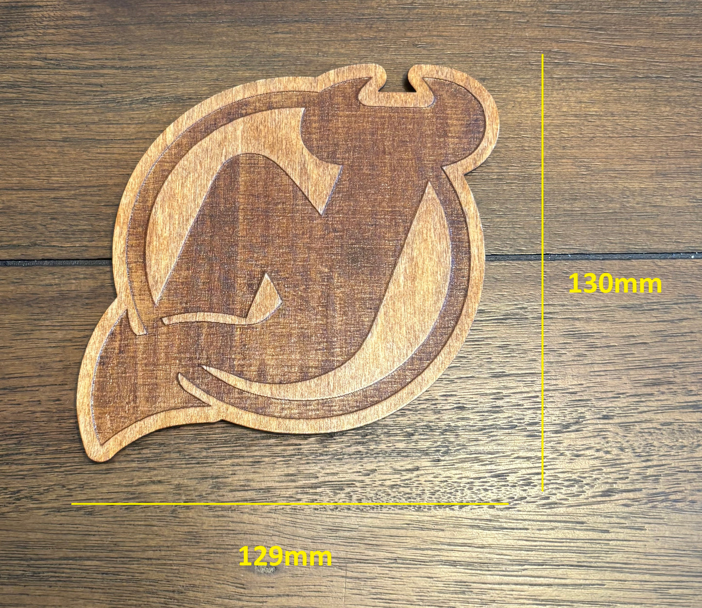 Stained basswood fridge magnet of the New Jersey Devils hockey team logo