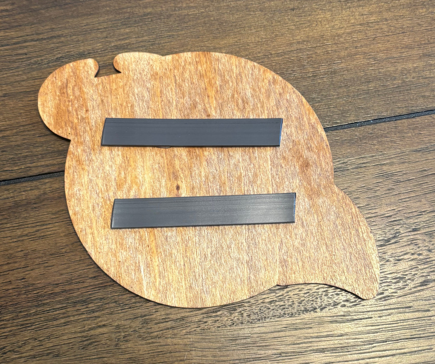 Stained basswood fridge magnet of the New Jersey Devils hockey team logo