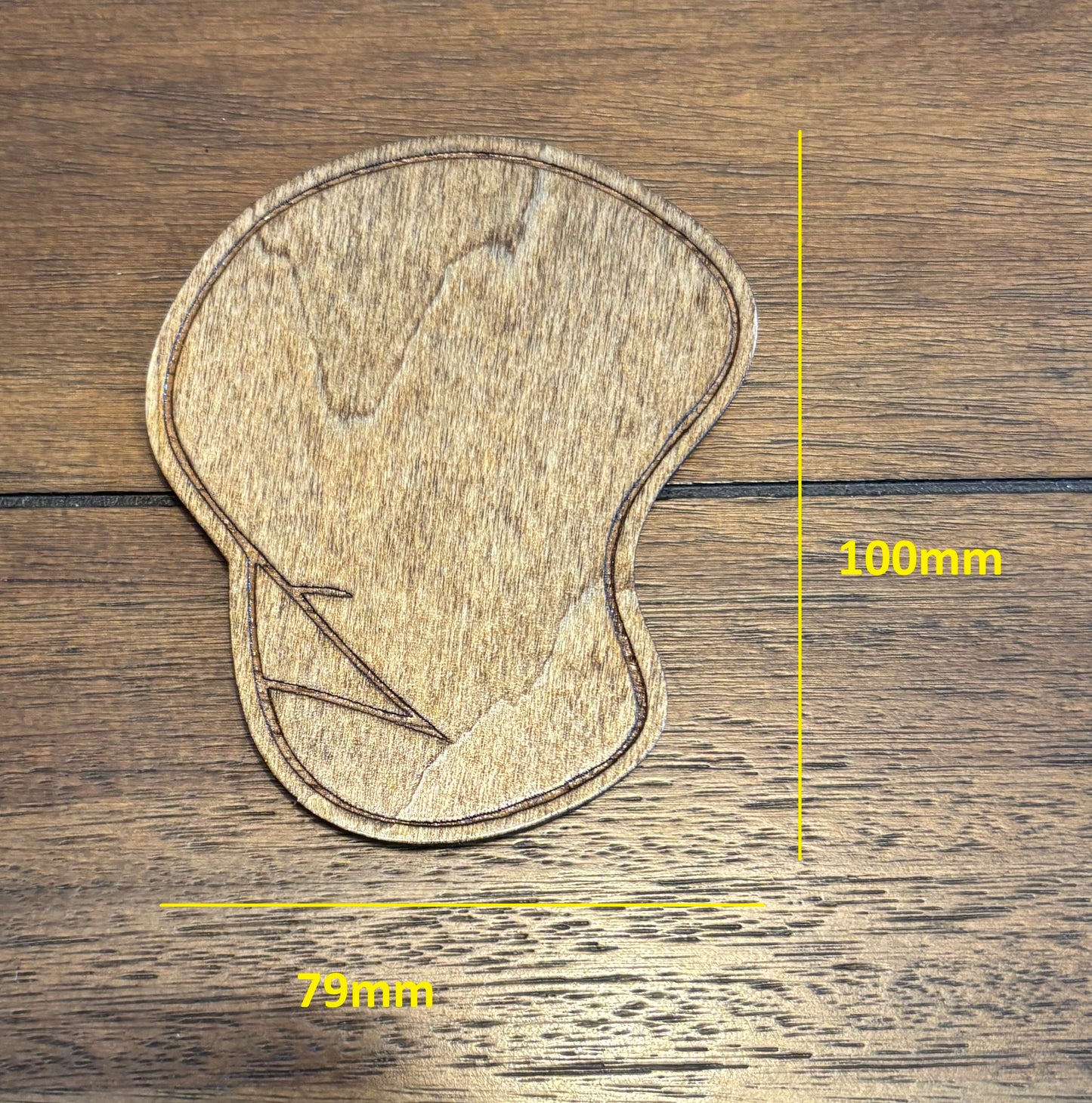 Stained basswood fridge magnet of the Dignity drawing from the Simpsons