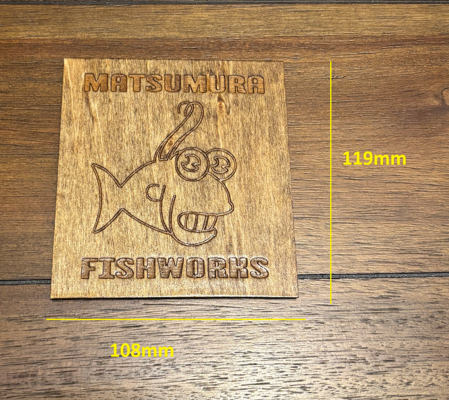 Stained basswood fridge magnet of the Matsumura logo from the Simpsons