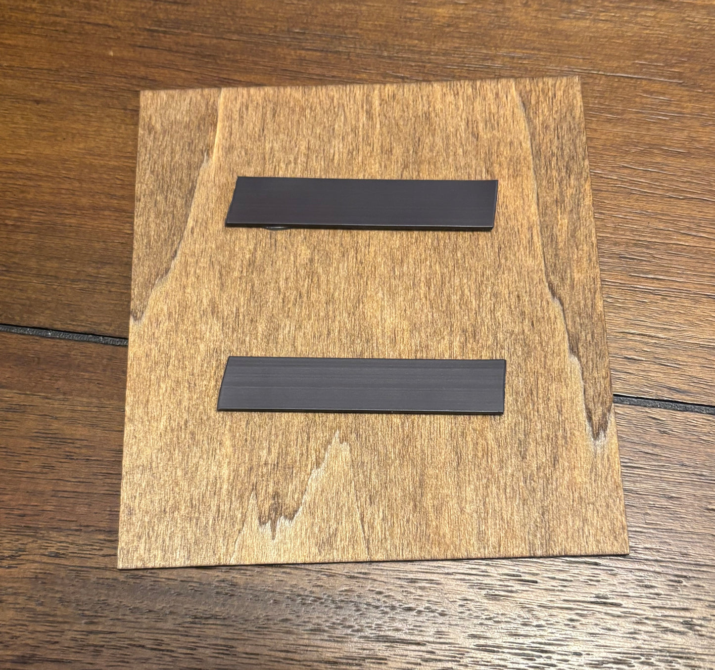 Stained basswood fridge magnet of the Matsumura logo from the Simpsons