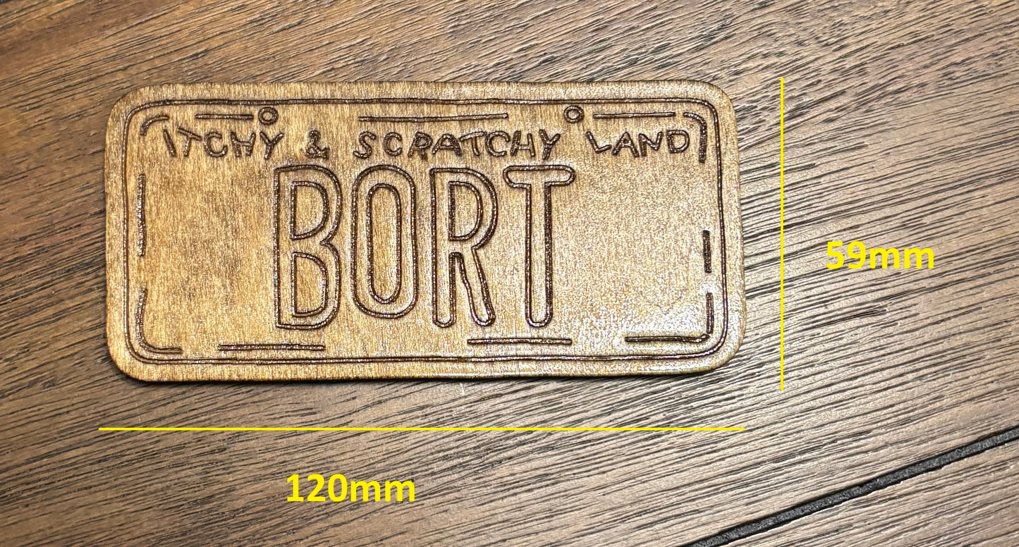 Stained basswood fridge magnet of the Bort licence plate from the Simpsons