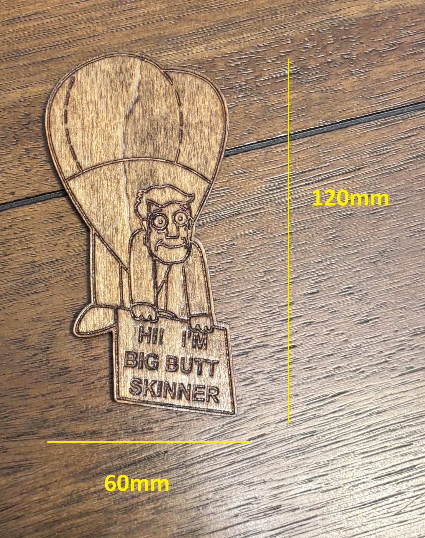 Stained basswood fridge magnet of Buttzilla from the Simpsons