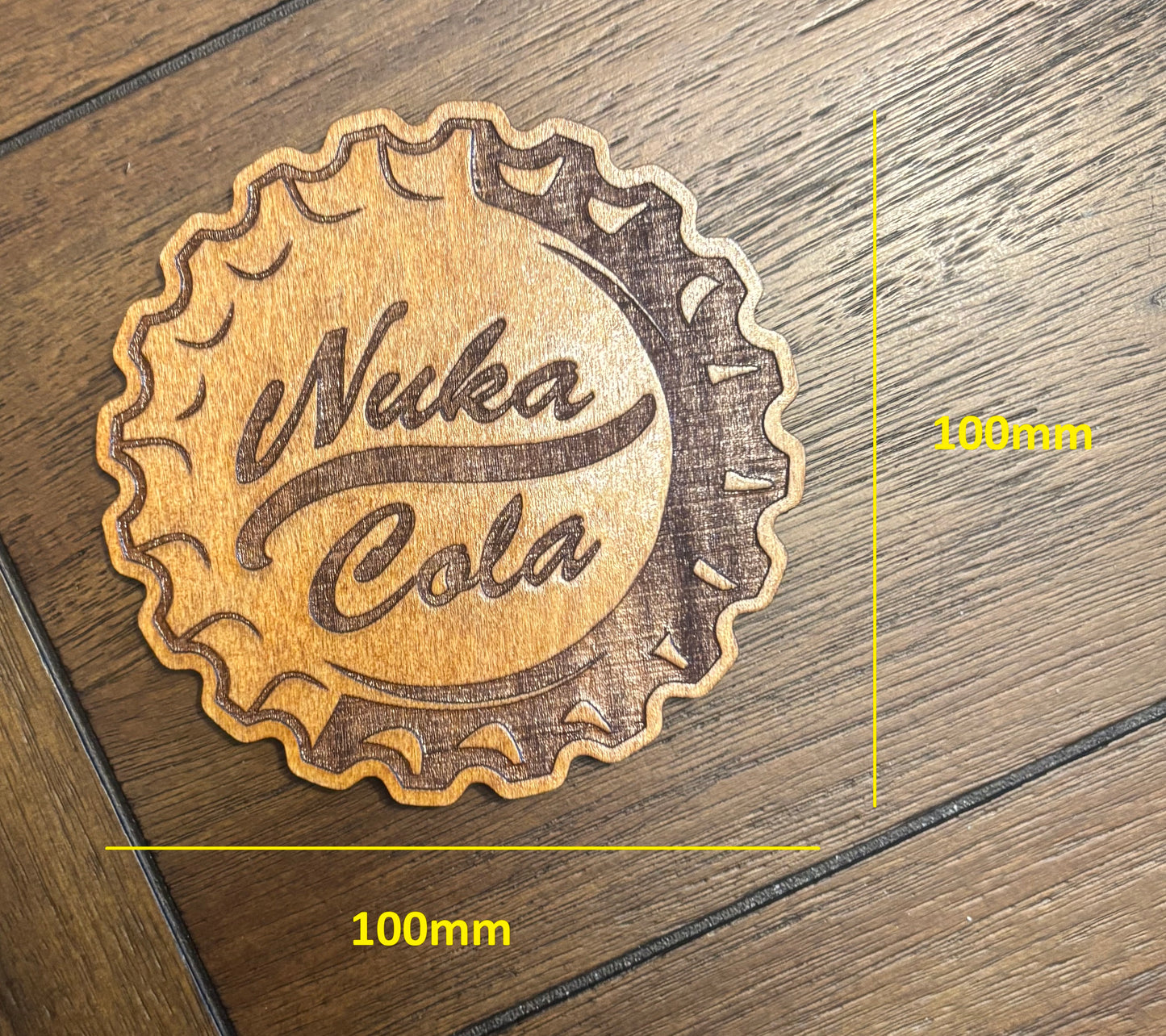 Stained basswood fridge magnet of the Nuka-Cola logo from the Fallout video games