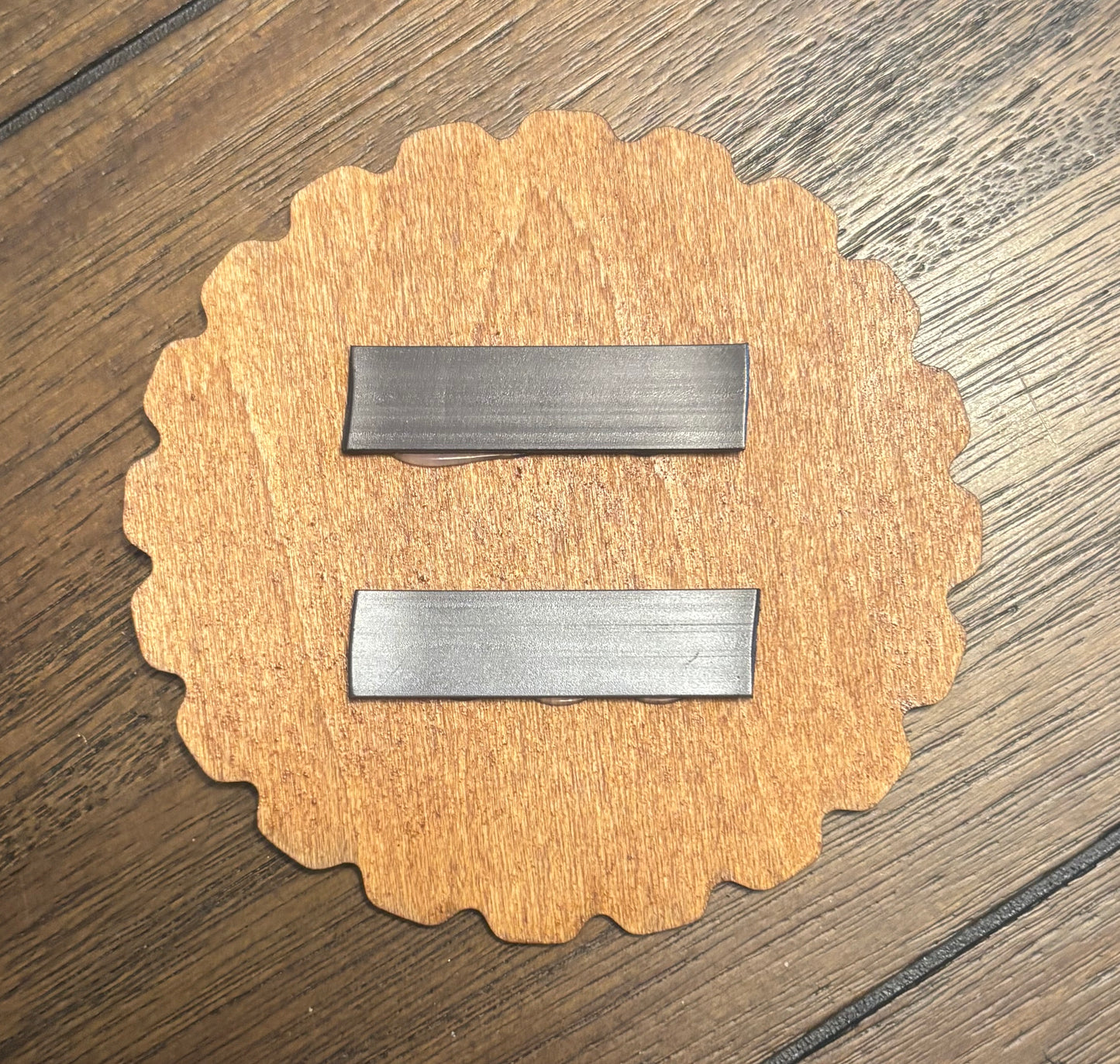 Stained basswood fridge magnet of the Nuka-Cola logo from the Fallout video games