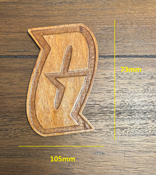 Stained basswood fridge magnet of a the Team Galactic logo from the Pokemon video games