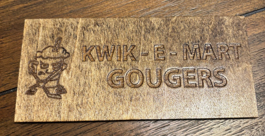 Stained basswood fridge magnet of the Kwik-E-Mart Gougers logo from the Simpsons