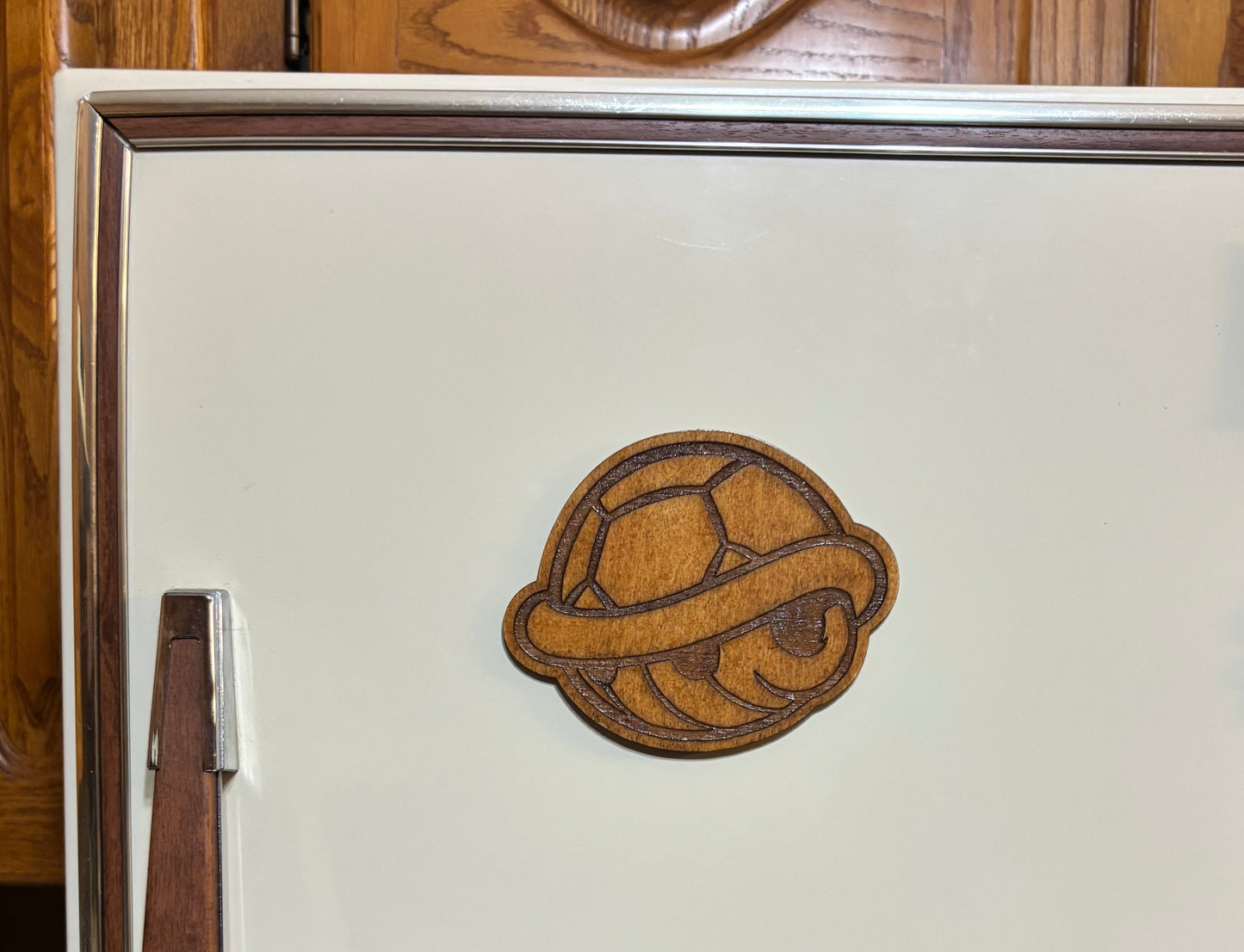 Stained basswood fridge magnet of a Turtle shell from the Mario video games