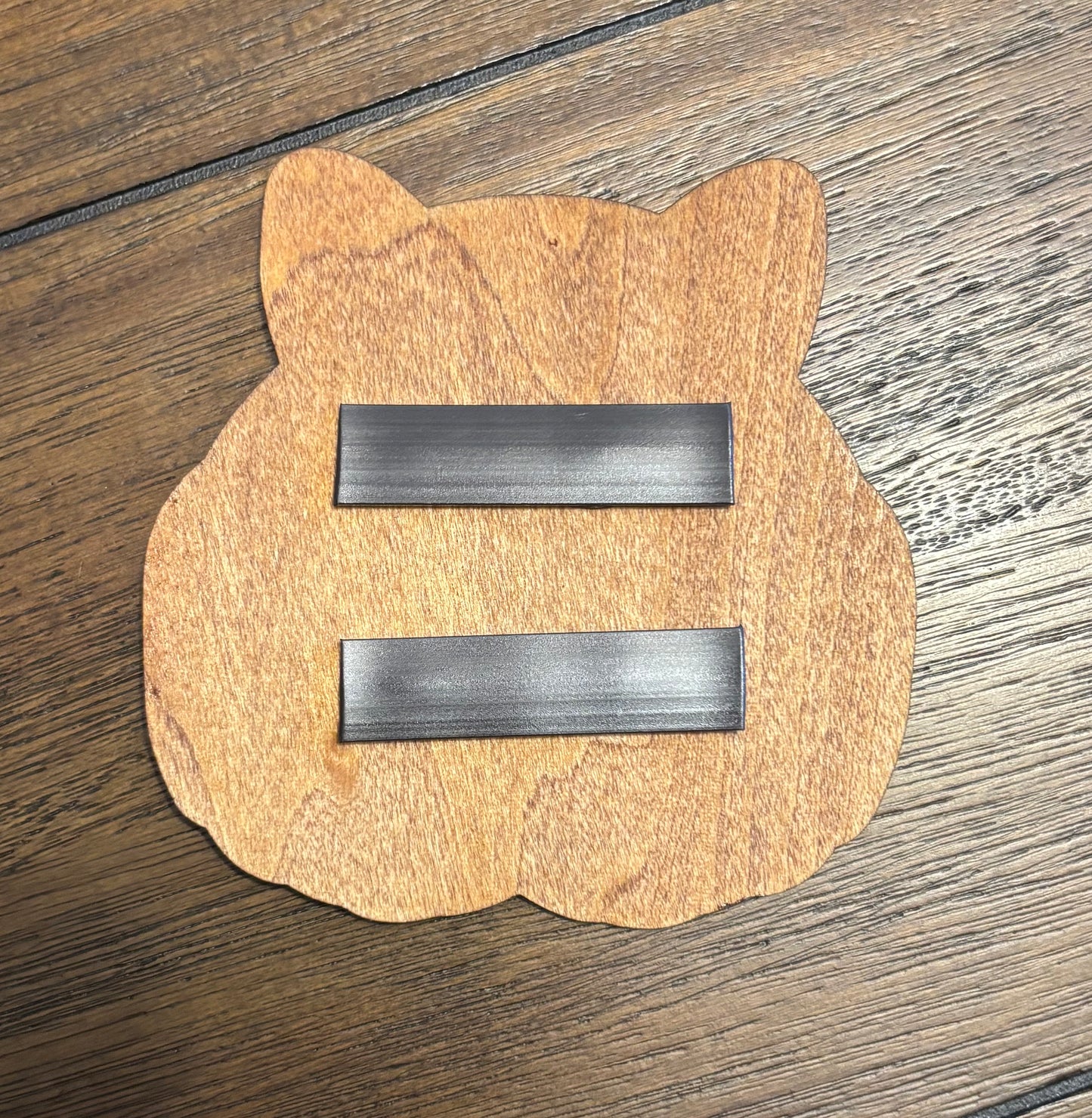 Stained basswood fridge magnet of the Solitude sigil from the Skyrim video game