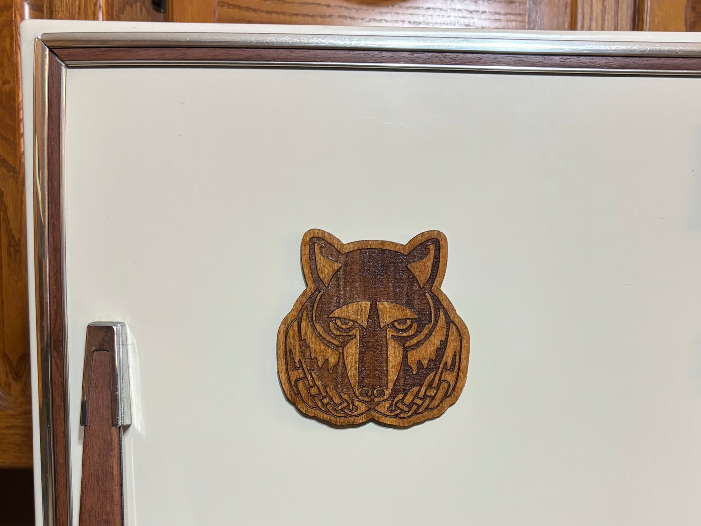 Stained basswood fridge magnet of the Solitude sigil from the Skyrim video game