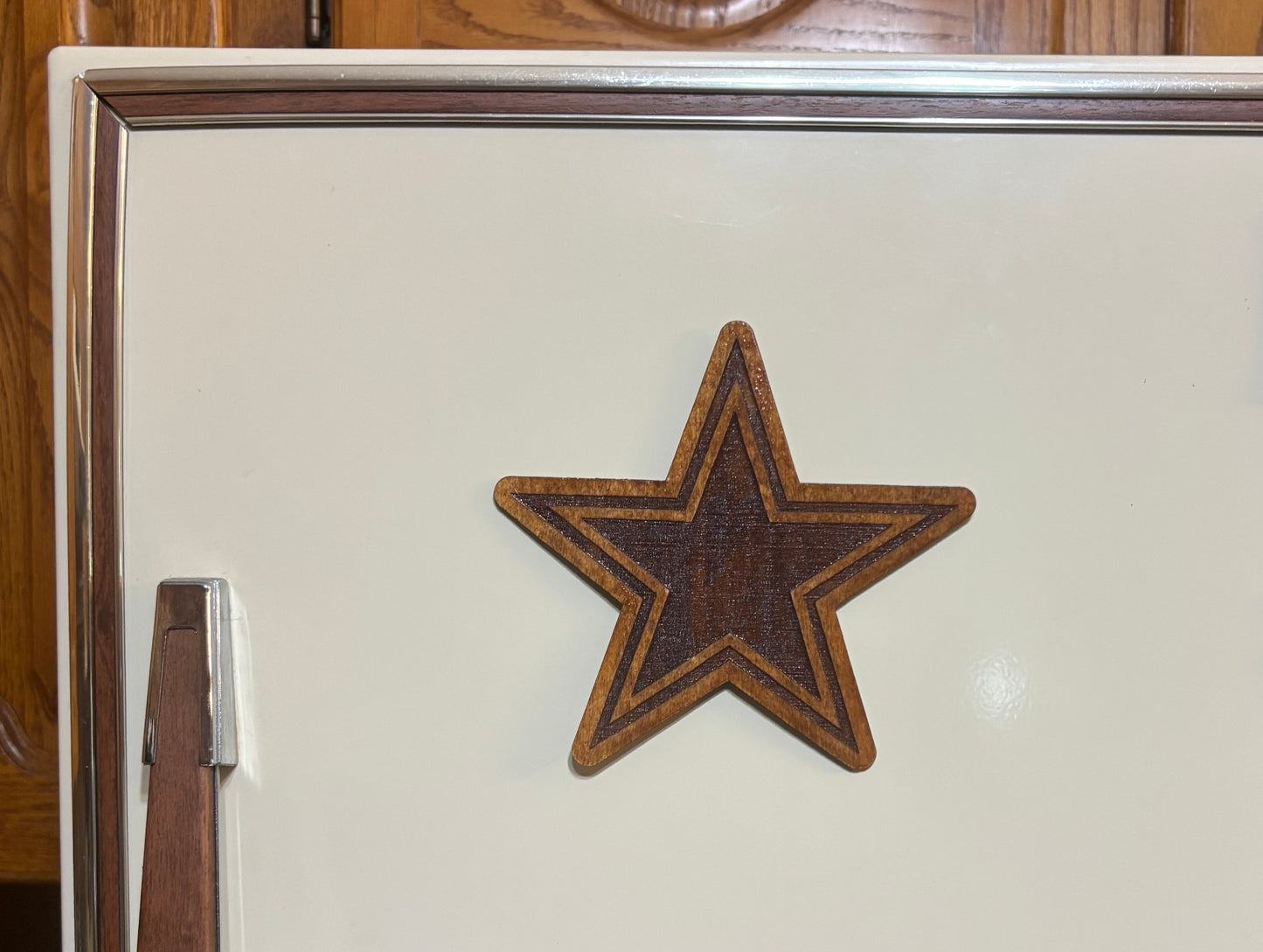 Stained basswood fridge magnet of the Dallas Cowboys football team logo